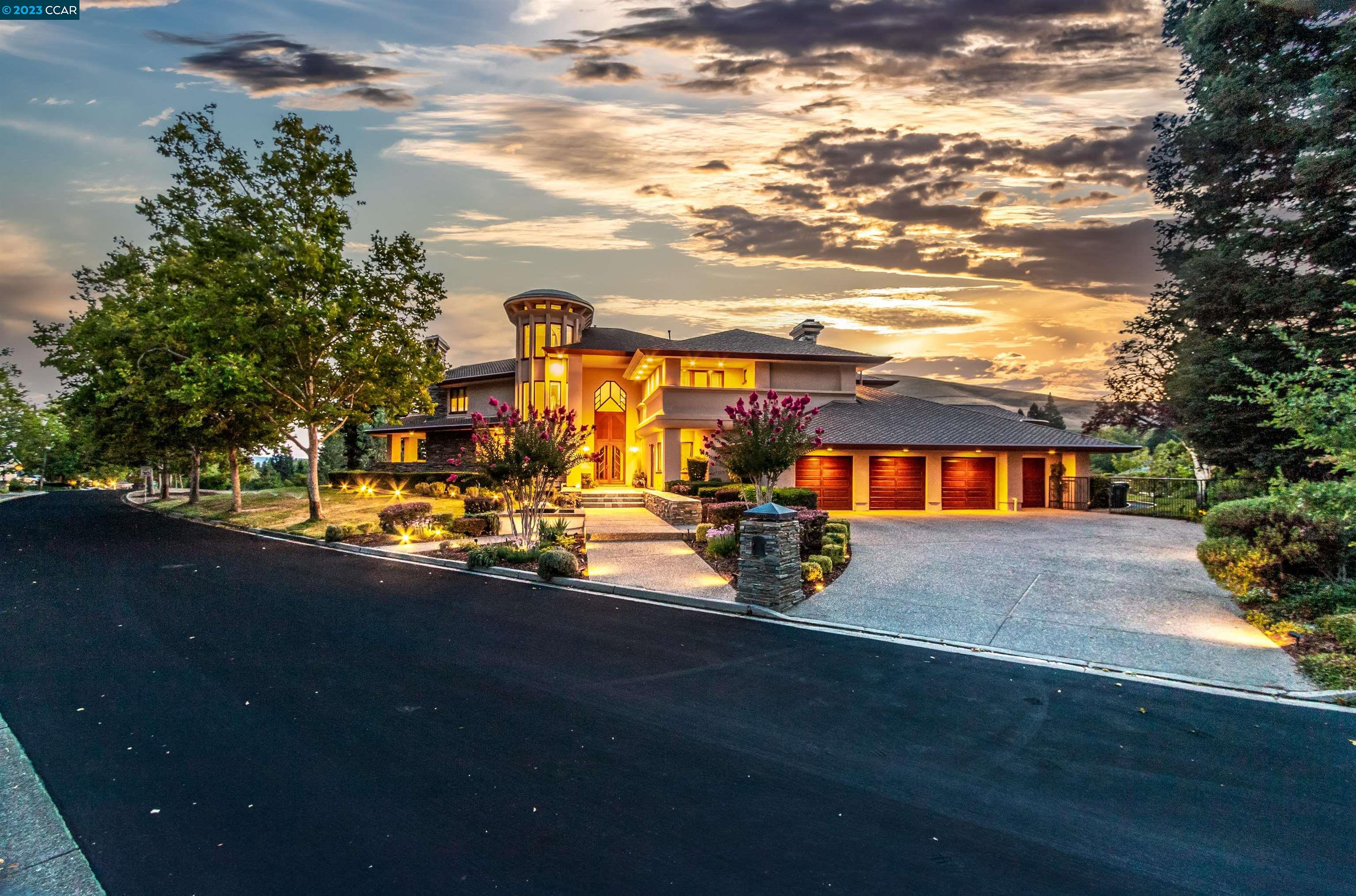 Architecturally stunning, custom-crafted Blackhawk estate. An ultra-private .41-acre sanctuary borders fairway & open space. A Jeff Behring 2-level design showcases jaw-dropping features throughout. 6,072 +/-sf. A mecca for entertaining. Unobstructed views from every window. 5 bdrms, 6 bths. Impressive slate flagstone floors. Magnificent ballroom-sized living rm w/custom built-in furniture, custom designed carpet, sunken lounge w/frpl; wrap-around view windows. Formal dining, rm, custom crafted built-ins; buffet, coffered ceiling. Gourmet kitchen w/white Corian counters, SubZero, Dacor, KitchenAid & Bosch appls. Stacked-stone frpl surround soars to top of dramatic 20-ft + barrel ceiling w/custom lit soffits in family rm. 1,000-bottle wine cellar behind double mahogany drs. Walk-around bar. Custom mahogany cabinetry. Main-level guest rm. 2 staircases. Primary suite, high ceiling, frpl, pvt balcony, 2 walk-in closets, en suite w/some marble finishes. Covered & open slate flagstone patios, pool, spa, garden bds. 3-car + golf-cart garage. 2 whole-house fans. Zoned lighting, Ecobus thermostats. Gated Country Club. 2 golf courses, clubhouses, tennis cts, sports complex, fitness ctr. Near top-rated SRVUSD schls, Mt. Diablo, Blackhawk Plza, downtown Danville, Livermore