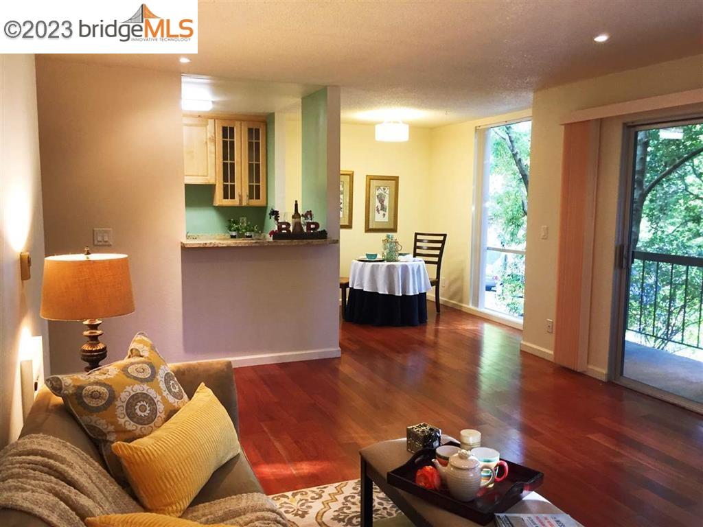 A super unit in a unique complex nestled within a tranquil redwood grove, a big balcony off the spacious living area, hard wood floors. Sunny, bright, and west facing with lots of light! 2 blocks to the north side of the UC campus and Greek Theatre, steps to Euclid St. shops and restaurants! A wonderful escape to seek peace and quiet from the busy world and nearby campus!