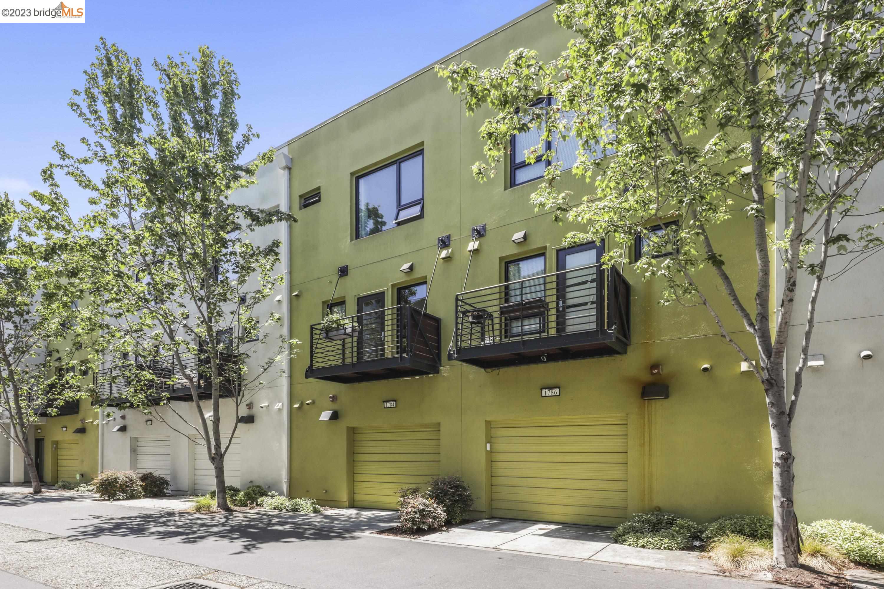 *Open House: Sunday, March 19th 2-4PM!* Nestled within the Zephyr Gate Complex in West Oakland is this bright and modern townhouse-style condominium that will impress even the most astute buyer. With three levels of living and contemporary finishes throughout, this is your chance to treat yourself to all the space and luxury you deserve without compromising on that easy-care lifestyle so many crave. The ground level is home to a two-car tandem garage, with interior access and a side-by-side washer and dryer in the laundry space. Upstairs, a light-filled and open-plan living space awaits with high ceilings overhead and beautiful bamboo flooring. A gorgeous kitchen, with a suite of stainless steel appliances and sweeping granite countertops, will appeal to those who love to cook and there is a door that opens out to a balcony with a leafy outlook. The third level is where you will find the two beautiful master bedrooms, both with new carpet underfoot, plus ample closet space and ensuite baths for added comfort and convenience. There is a 1/2 bath on the mid-level, too, while a hall closet completes this impressive property. There are low HOA dues and West Oakland BART, highways and Bay Bridge are minutes away and you can enjoy easy access to the Oakland Ferry Terminal.