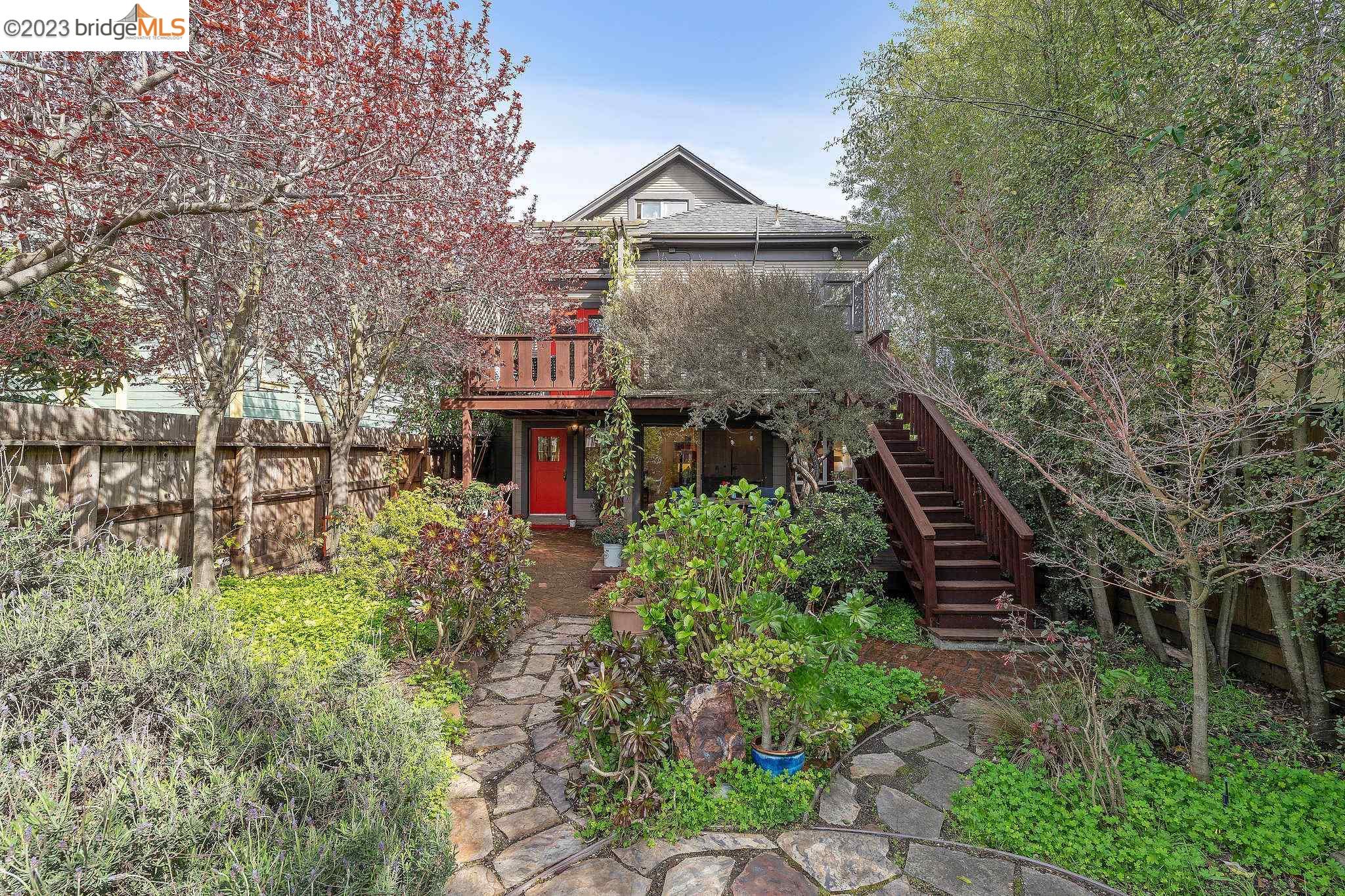 Great opportunity to own a vacant multi-family property in the heart of Berkeley!  Built in 1902 as a single-family home, the house was lifted to create a second unit (with permits).  The deep lot and lush garden allow for good separation from a large cottage in back.  The top floor unit has classic period details and modern upgrades as well.  One bedroom and one bathroom on the main floor and another bed and bath in the bright converted attic.  Since there are two "living" rooms, one was used as a third bedroom.  A west-facing deck provides even more living area.  The ground-floor unit has two bedrooms, one bathroom and a deck of its own.  Shared laundry.  Tucked away at the back of the lot is a delightful fully-outfitted cottage with it's own back yard that has served many purposes over the years.  The possibilities are endless.  And the location can't be beat.   BART, Trader Joe's, UC Berkeley and downtown are just blocks away.   Although there are two off-street parking spaces, you may not need that car!