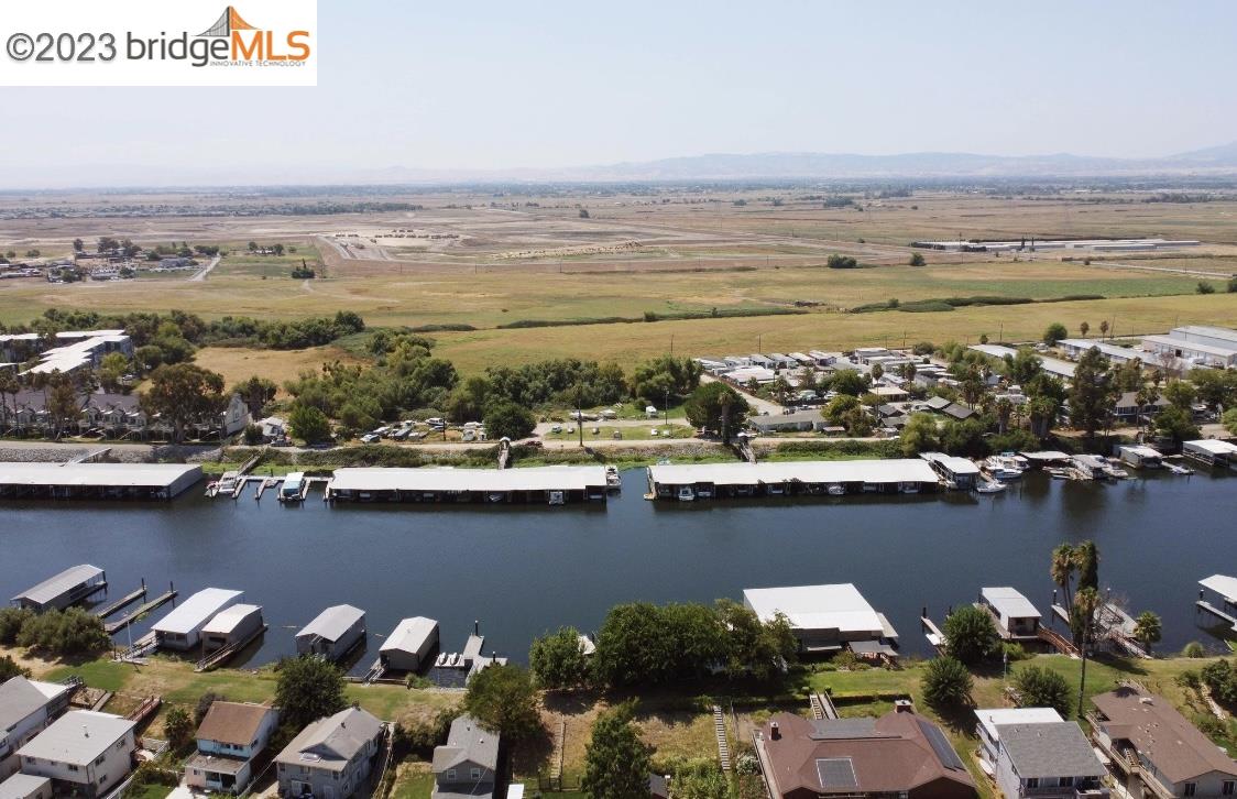 This Marina offers spectacular views of the waterways and rests in a quiet location on the Northern California Delta with immediate access to fast water - Perfect for bass fishing, wake boarding & waterskiing. The marina features a calm peacefulness that we think showcases what the Delta is all about. Every single one of our boat slips features a stunning view of the of the Delta, something you won't find at most marinas! Whether you are planning a vacation or a getaway. You will find what you are looking for at this Delta resort. The Area is perfect for recreational activates from relaxing to fishing and boating. This property has boat slips, store, Lauch ramp camping area and large lawn areas.