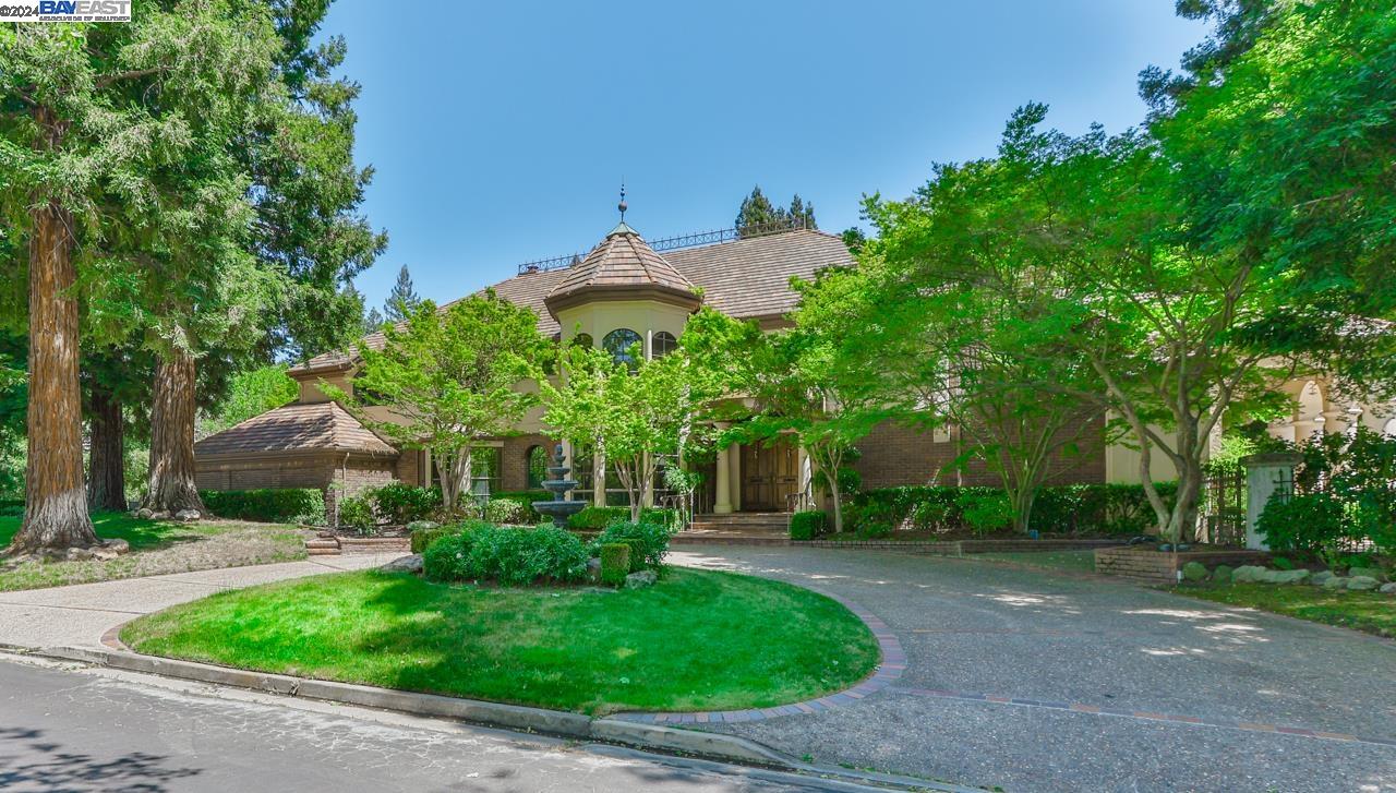Two parcels with separate addresses and utility connections!  Luxury estate with elegant design, originally built by the legendary Blackhawk Ranch owner Mr. Howard Peterson. The exquisite estate situated at the most convenient yet private location inside the prestigious Blackhawk Country Club. Two parcels (APN 203-410-018 and 203- 410-019) with combined land over 2.2 acres. Park like setting with perennial creek in the back and golf course/lake view in the front. Grand living room with cathedral ceiling opens to gorgeous garden through the porch with Roman style colonnades. Classic game room with pool table and mahogany wall decorations. Super sized family room with walnut wall panels includes a wet bar of full functions. Large wine cellar and 5 car garages for your luxury collections. Guest house with full kitchen, family room and even a Sauna room. Two outdoor kitchen areas with multiple patios/decks.