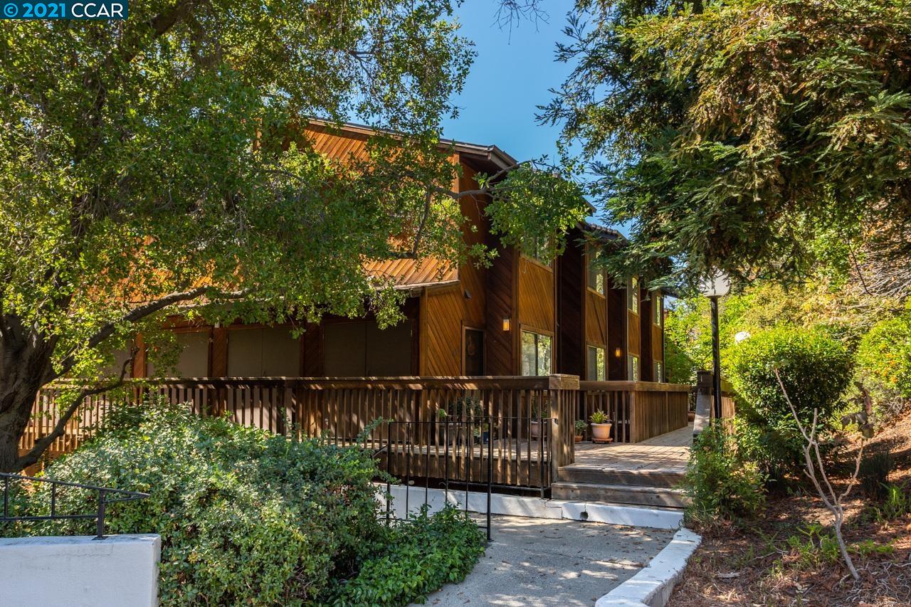 A lovely and uniquely private Condo located in a Retreat-like setting overlooking a creek.  This home is within walking distance to all the amenities of downtown Walnut Creek--shopping ,fine restaurants, theatre ,library, Civic Park and night life.  A wood deck off the living room overlooking lush mature trees and wooded creek provides a perfect space for reading while having your morning cup of java or tea. The Living room features a cozy gas fireplace and recessed lighting.  The in-unit washer/dryer stays.  An updated kitchen and appliances give the home a modern feel.  The front patio is a perfect space for plants and an extra storage locker outside and up the stairs is also provided.  Enjoy your family and friends at the gathering place called the Roof Deck that overlooks Civic Park and a walking bridge to the Walnut Creek Library.  The Community Pool is very accessible to the home. Highly rated Walnut Creek schools are available.