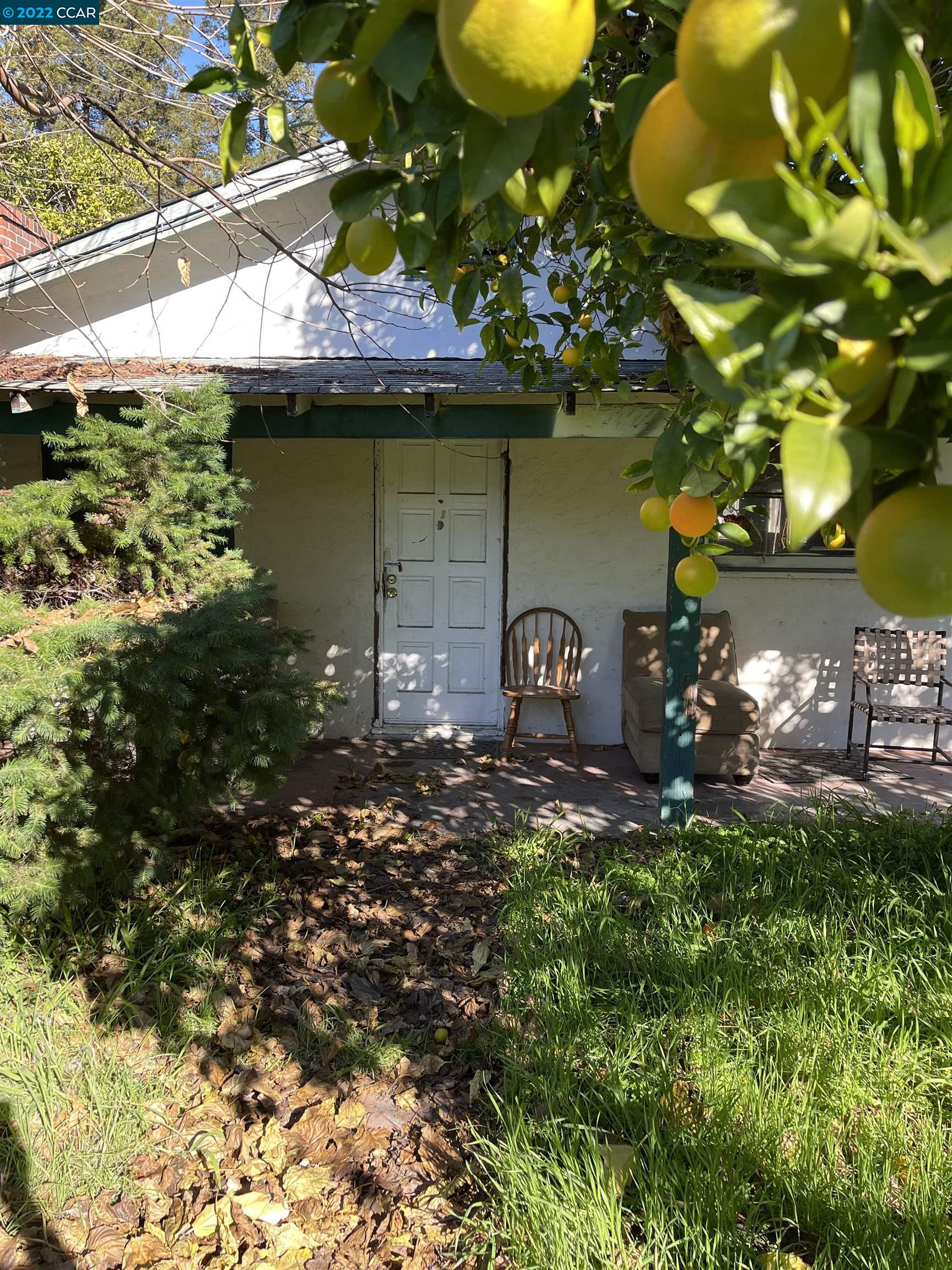 Fixer on over a half-acre nestled in desirable Springwood neighborhood.  Quiet location has heritage trees, well and cellar.  Two barns for storage of vehicles and equipment.