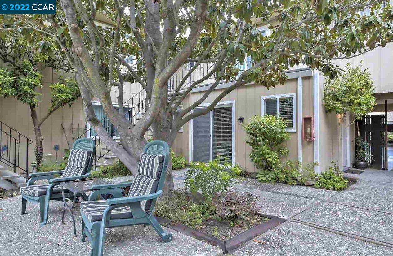Nicely maintained single level condo in a nice complex. Ground level unit without any stairs. Features include dual pane windows, updated kitchen and bath, and a bonus den. Nice views of Moraga hills from patio. One assigned carport close to your unit. HOA includes water and trash! Fantastic location near BART, trails, restaurants, schools and more.  No rental restrictions.