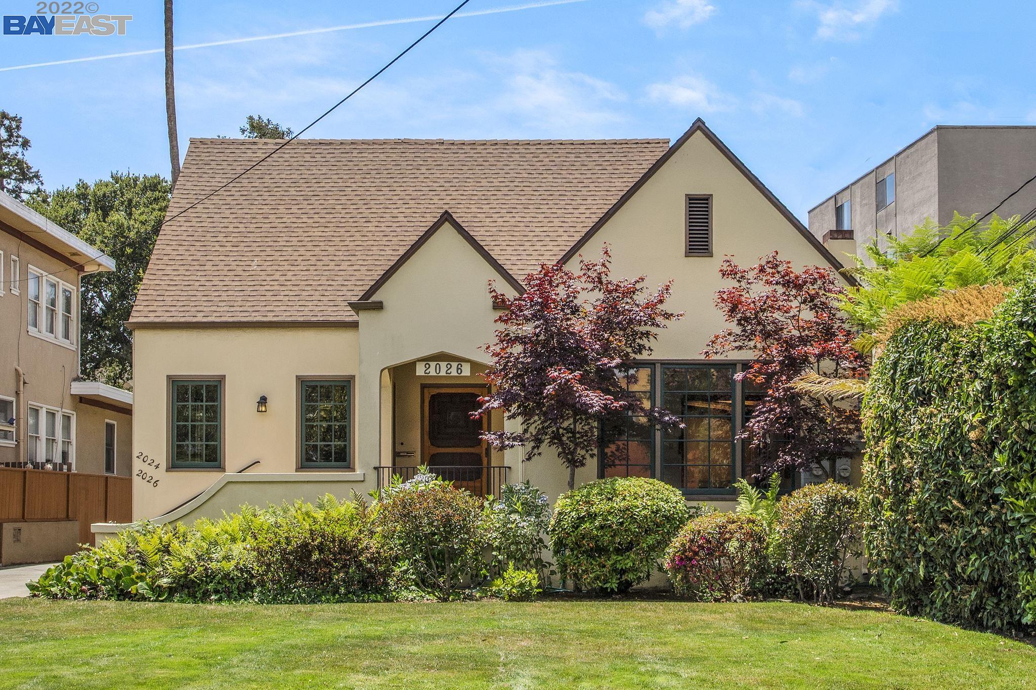 Tremendous opportunity! Live, work, rental, & possible ADU - all on a huge lot approx. 10,384 (twice the size of most Alameda lots). This classic, 1932 Tudor-Style home is set back from the street with a long driveway to the rear carports, 1+ Car garage, RV parking & more. The home and studio are approx. 2576 sf. Used as a dental office for 25+ years, the existing layout has 4BR’s, (2) half baths, a downstairs workroom, & large attic, w/ a separate rental studio apartment to offset your mortgage. The traditional formal living room has vaulted ceilings, original ornate fireplace surround, mahogany doors & trim, large picture window, & hardwood floors. A lattice-covered redwood deck off the upper bedrooms extends across the rear of the home and leads to a lovely backyard with oak trees, roses, & jasmine. Make this one your dream home! An application has been submitted to the city to reconfigure the home to a 3BR/3.5BA home with 2 primary suites, a gorgeous, open kitchen + a new ADU.