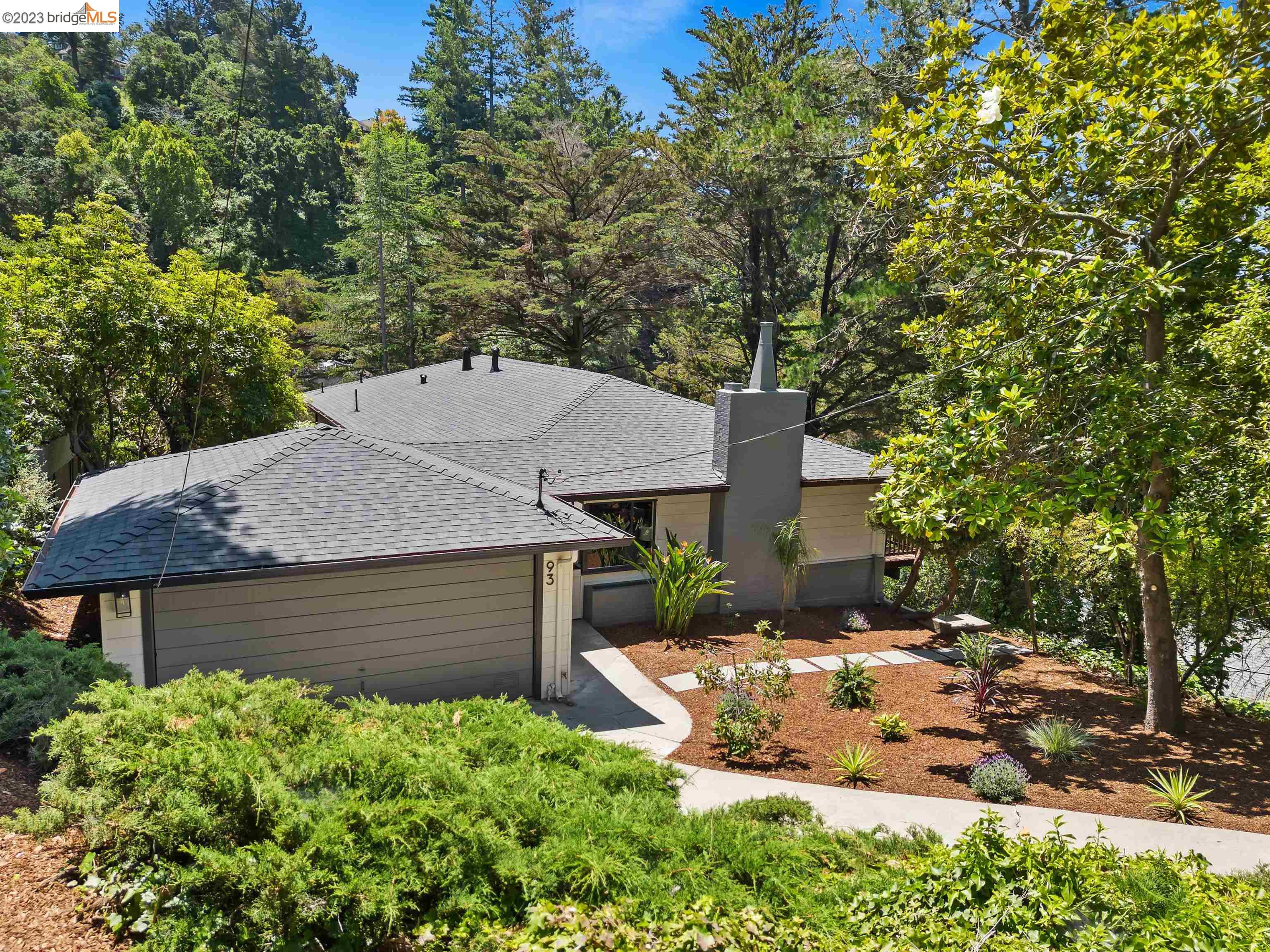 This hidden Jewel is located in the Upper Rockridge area of Oakland, within walking distance to Montclair on a quiet cul de sac.  This location is known for its beautiful tree-lined streets.  It is a highly sought-after neighborhood with a great sense of community. The exterior of the home has been well-maintained with a new roof, fresh paint, and landscaped grounds.  Inside, all rooms have been refinished, giving the home a warm and inviting feel.  The kitchen has been completely renovated with prefab quartz countertops, backsplash, refinished cabinets, undermount sink, disposal, refrigerator, dishwasher and a new gas stove, among other upgrades. Downstairs, there is new carpeting for added comfort.  You also have the opportunity to entertain on the deck or patio, or just enjoy quiet evenings alone.  Overall, this property offers a combination of modern upgrades and classic charm, making it a great place to call home.