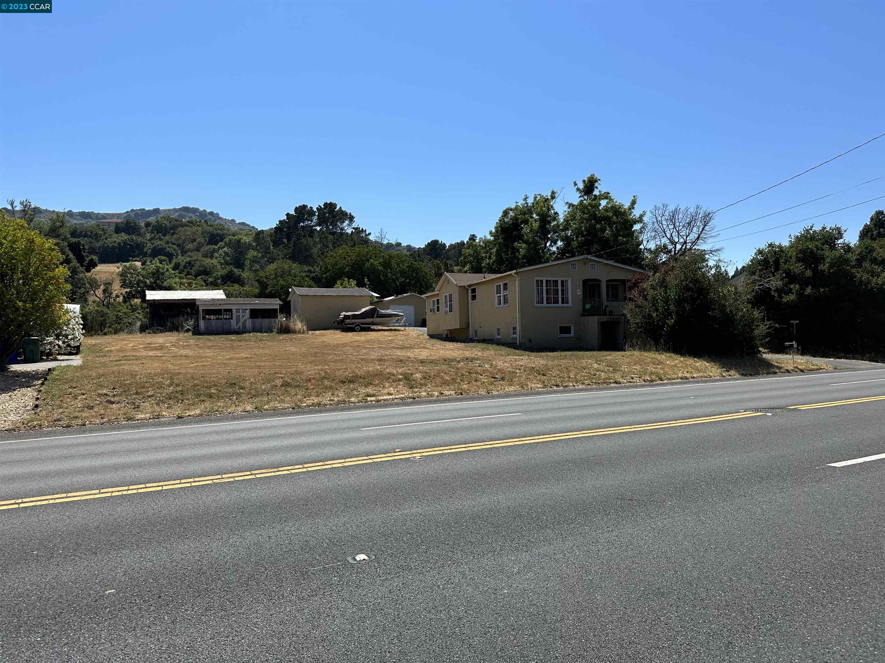 One of the last Large parcels available in El Sobrante over 8.54 acres. Nice Farmhouse with 3 Bedrooms, 1 Bath, 1386 sq ft, Big Detached Garage, Barn and several detached Sheds on the property, Fantastic location about 7 miles to Orinda, Development potential, PLEASE DO NOT DISTRUB OCCUPANTS/TENANTS.