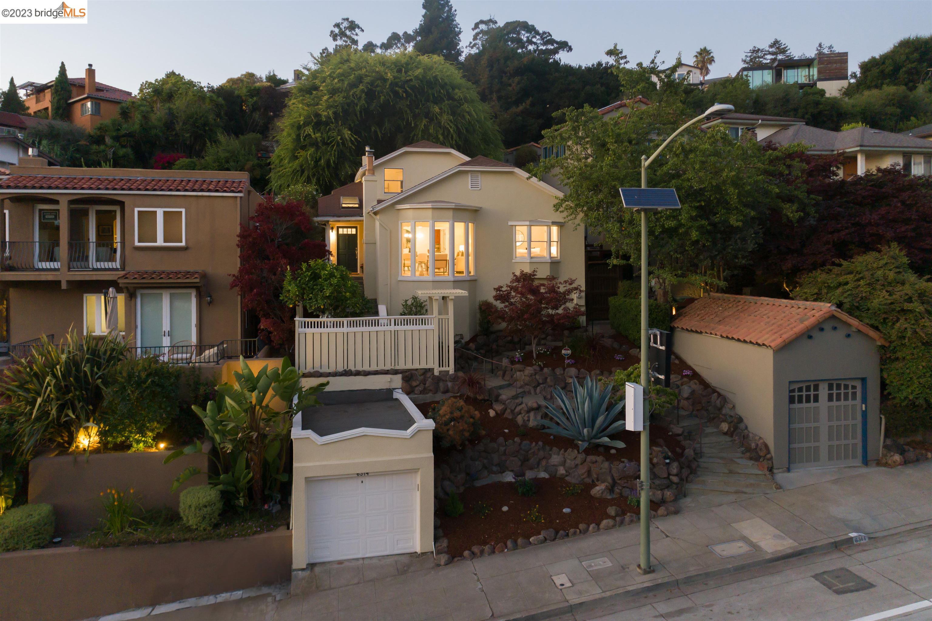 Located in the heart of Upper Rockridge, this lovely 3 bedroom, 1 bath traditional home boasts incredible views and a large back yard. Enter to light filled spaces, hardwood flooring and comfortable style.  The living room with fireplace features lovely bay windows. The adjacent dining room is the perfect place for family meals. The kitchen, with stainless steel appliances, pantry and granite counter tops will delight any home chef. 2 ample bedrooms and a full bath complete this living level. Upstairs, another large bedroom overlooks the large rear yard. An oasis all its own, the yard meanders to a large deck that overlooks San Francisco and the Bay. A lovely spot for outdoor entertaining, morning coffee, gardening, play or room to roam for man's best friend.  Close proximity to Lake Temescal, Hillcrest School and the Terrace Coffee shop and moments from all that the East Bay has to offer, 6314 Broadway is the perfect place to call home.