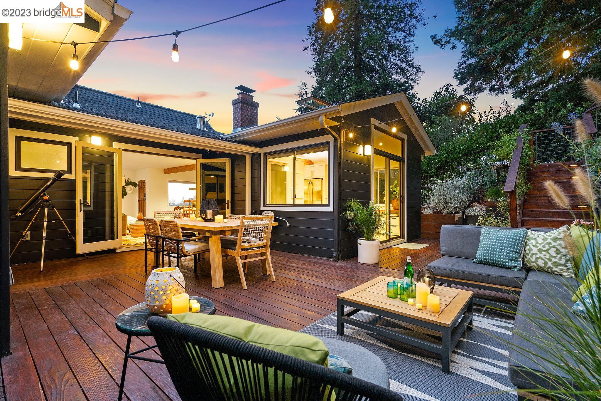 Perched on a private court with Bay views, minutes from Montclair village, this impressive 3bd/3ba home got a stunning remodel to open it up give it a wow-factor! Vaulted ceilings, exposed wood beams, skylights, glass doors and picture windows welcome the outdoors in, creating the perfect indoor/outdoor flow from four entry points on the main level. The stylish kitchen is awash in natural light with luxury appliances, wine fridge and separate ice maker, open shelving, and a skylit bonus room with yard access perfect for a home office, eat-in space or both! The great room features large windows framing the views, a beautiful fireplace and elegant hardwood floors throughout. The primary suite has sliding glass doors to the garden and an updated bathroom with skylight. A full guest bathroom and large secondary bedroom complete the main level. Downstairs is another primary suite, additional storage, and interior garage access. The backyard enjoys a spacious wrap around deck, beautiful terracing with a flat play space, low-rise steps with built in lighting that lead up to the sunset sanctuary space: a detached home office/gym with AC, a Redwood soaking tub and built-in firepit for enjoying the sunsets and big Bay views! NEM2 Solar on the roof completes the package.