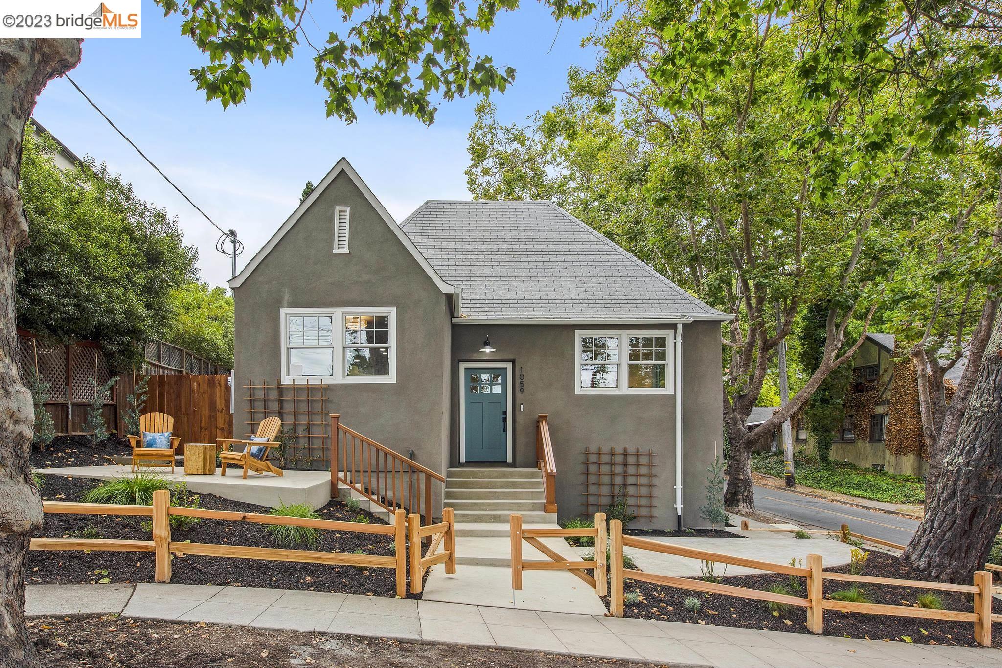 1059 Euclid Ave, a Tudor-style cottage exuding charm and character, is nestled in the picturesque Berkeley Hills in the coveted North Cragmont neighborhood.  This enchanting home has been lovingly restored offering a seamless blend of 1920’s elegance & modern comforts.  White oak hardwood floors flow gracefully throughout, creating a warm and inviting atmosphere. The heart of this delightful residence is undoubtedly the kitchen, showcasing Electrolux appliances, spacious island, ample cabinetry, tile backsplash, pantry & adjacent laundry room with access to the rear patio.  The primary bedroom suite boasts a sumptuous bathroom with marble tile, dual vanities, & walk-in shower. Two additional bedrooms provide ample space for family or guests, and another beautifully appointed bathroom ensures convenience for all. Flexibility is a defining feature of this home.  A formal dining room can easily be used as a home office and a full-height attic can be converted into another bedroom/office with amazing views. An attached two-car garage and a small storage/studio space invite creative pursuits or simply serve as storage and parking.  AC Transit's Line 65 stops next to the home, providing a seamless connection to downtown Berkeley, BART and Tilden Park, the famed 2,079 acre park.