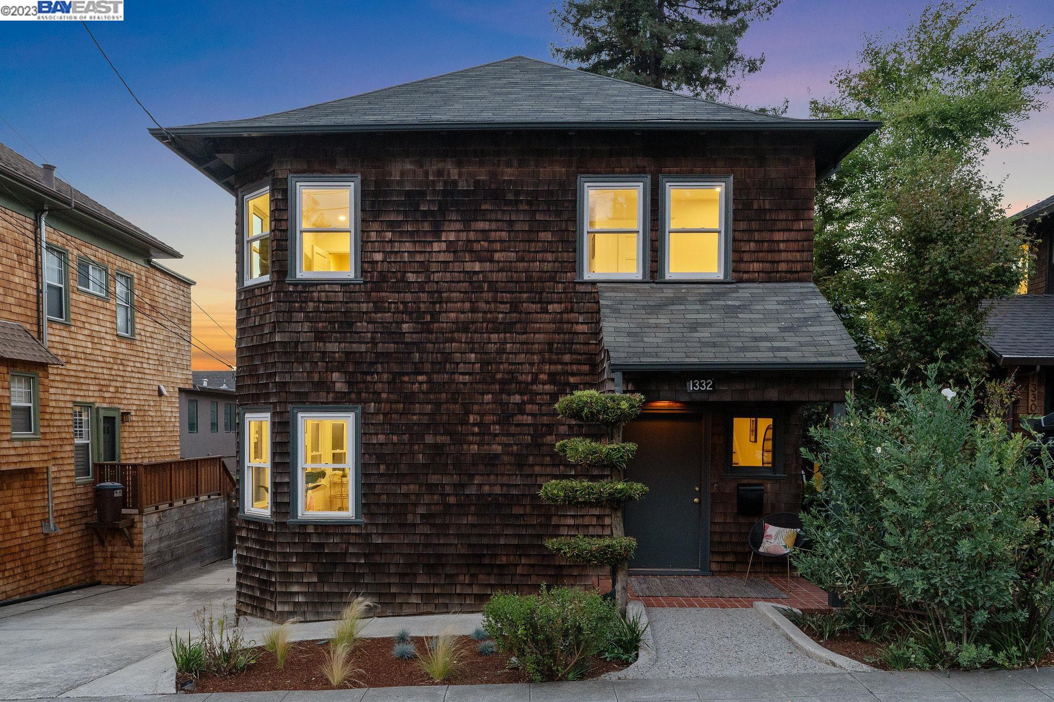 A lively California lifestyle awaits in this classic brown shingle 4BD/1.5BA home in one of Berkeley’s most sought after neighborhoods. Just blocks from award winning Gourmet Grotto, this 1792 SqFt brown shingle boasts light filled living and dining spaces and four gracious bedrooms upstairs. Step inside the beaming foyer and you’ll ease into the home’s perfect flow. The oversized formal living/dining room has an elegant coved ceiling with a stately mantle and fireplace. Gorgeous wood floors span through an open archway into another living area with built-in bookcases and cabinets, offering space for a sunny office, family room, or dining right off the updated kitchen. A powder room is nearby, and a laundry room is right outside the kitchen door. Off the small deck, the backyard has mature trees and great space for entertaining or play. Back inside, the refined staircase leads from the foyer to four bedrooms with nice closets and bonus spaces, a large linen closet, and an updated full bath. Ample storage is below the home, and a long driveway offers plenty of off-street parking. With great schools, short walks to Live Oak Park or the Berkeley Rose Garden, and a short drive to Tilden Park with hiking, swimming, and Little Farm, this is a great home to enjoy the best of Berkeley.