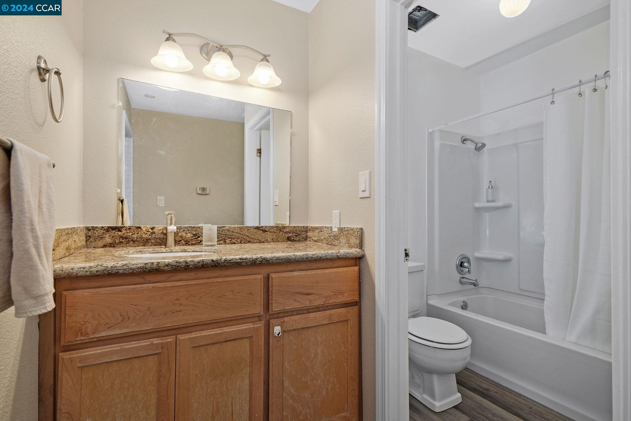 Vanity area adjacent to Bathroom