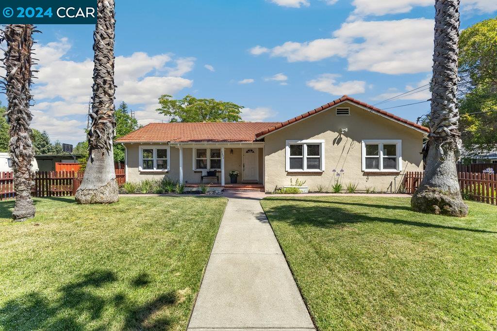 This charming 1940's Carmel style home is thoughtfully designed with three generously sized bedrooms, two full baths, hardwood floors and an abundance of natural light. It has a large basement with the potential for an office, storage or additional living space conversion. The flat 0.6 acre lot is a blank canvas for the new owner's imagination - ADU, pool, sport court...so many possibilities. Conveniently located in the desirable Parkmead neighborhood and near downtown, Kaiser hospital and easy commuter access. Welcome home!