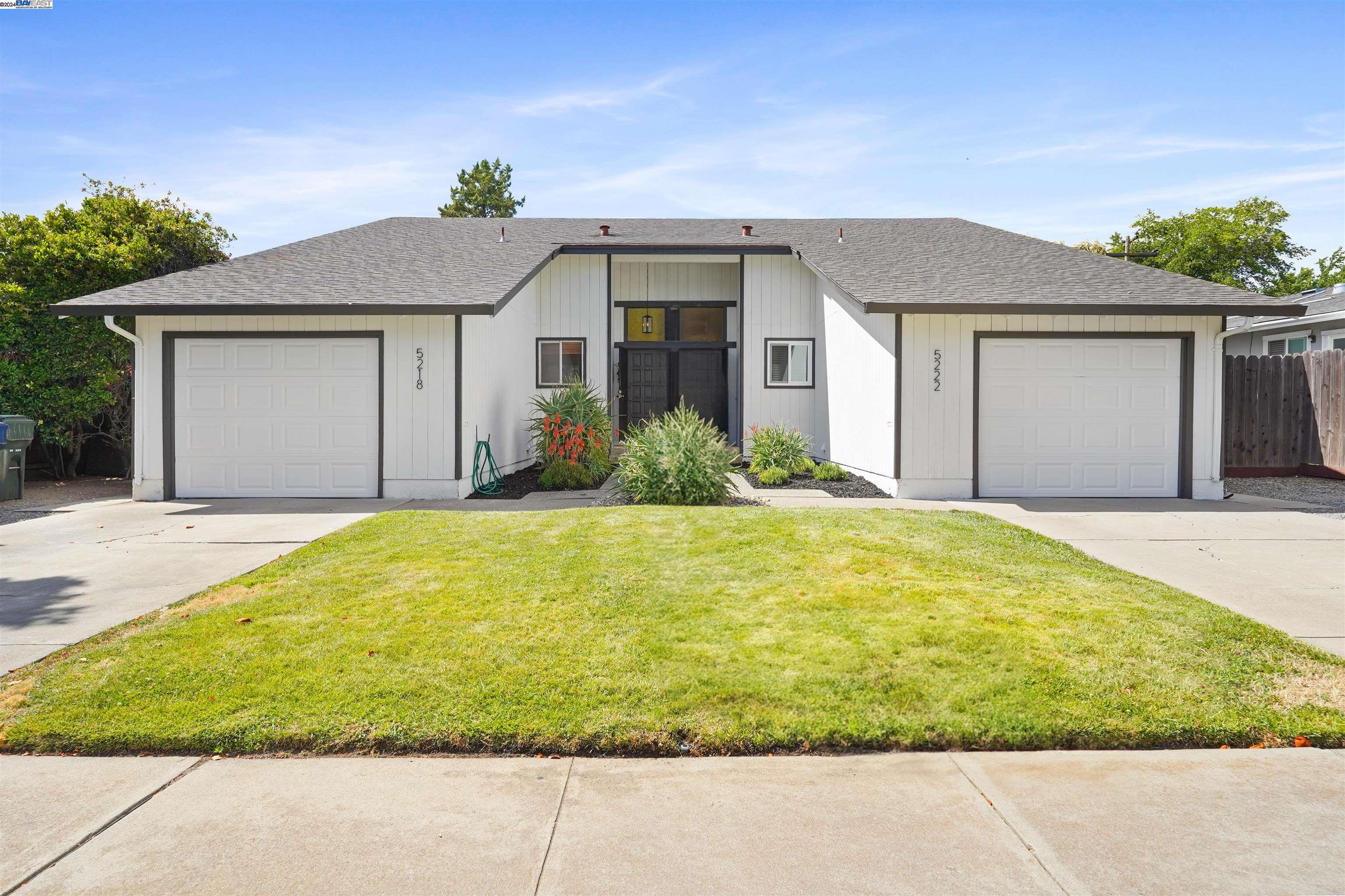 Welcome to this incredible opportunity in Livermore Valley Wine Country! This property at 5218 Norma Way and 5222 Norma Way offers not just one, but two charming homes for the price of one. Situated within walking distance to the prestigious Lawrence Livermore National Lab, this duplex presents a unique investment or living situation for the discerning buyer.  The first unit features a spacious three-bedroom, two-bathroom layout spanning 1332 square feet. Adjacent is the second unit, boasting two bedrooms and one bathroom across 1075 square feet. Each home provides its own private yard, garage, and entrance, blending convenience and privacy seamlessly.  Whether you're an astute landlord looking for a promising investment property or a large family seeking dual living arrangements, this listing is a dream come true. Don't miss this rare chance to own a piece of property in a prime location with endless possibilities!