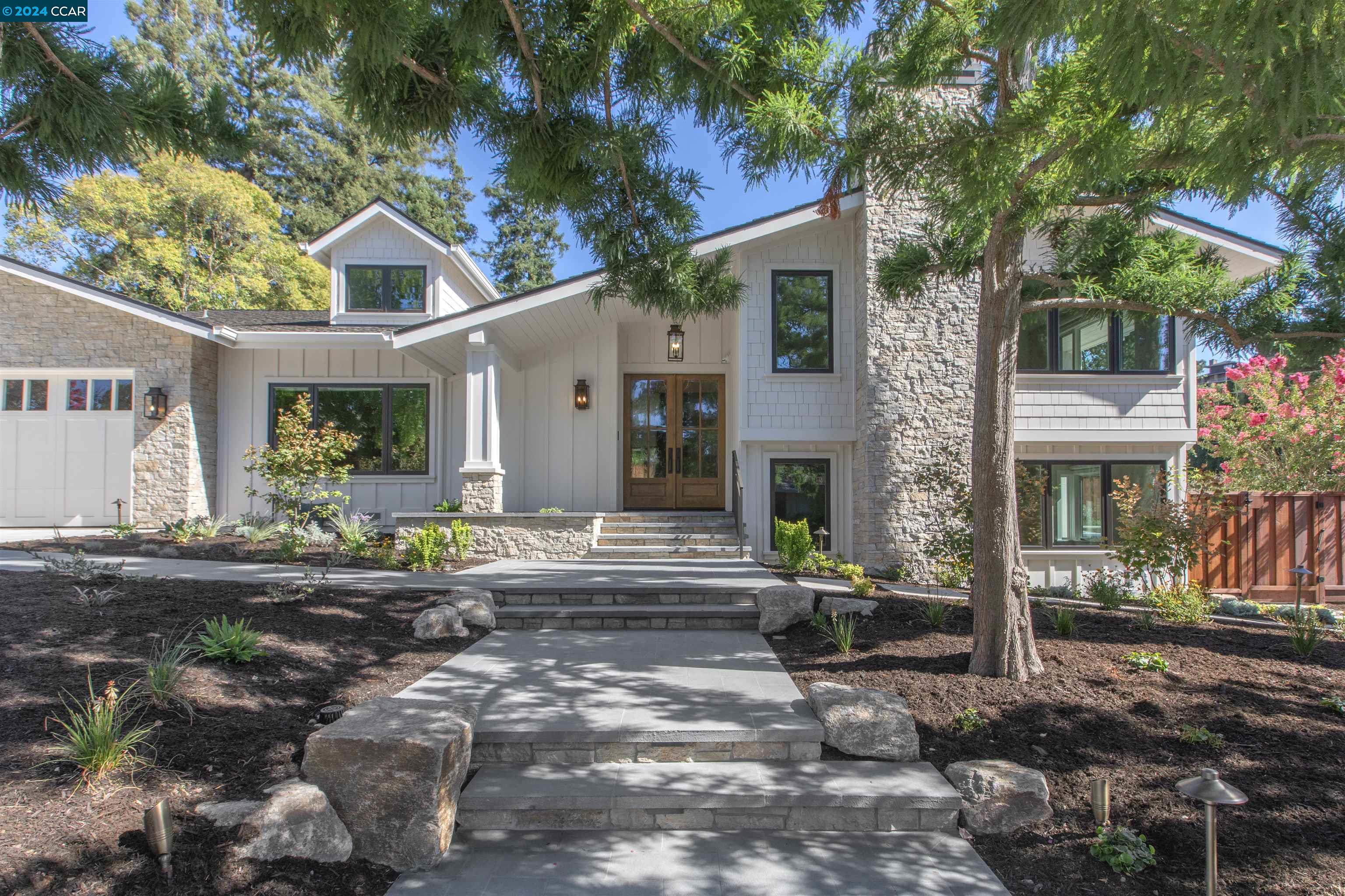 Unparalleled elegance awaits in one of the most stylish and thoughtfully designed homes in Roundhill. Nestled in the heart of one of the Bay Area's most coveted communities, this architectural masterpiece, designed by William Wood, redefines luxury. Every detail has been meticulously considered like soaring ceilings in the great room, white oak flooring, custom stone fireplace, Calacatta marble island, Wolf Range, Sub Zero refrigerator/freezer, wine storage and beverage cooler, all surrounded by custom, solid wood cabinetry. Just off the great room is a well appointed office with custom built ins, wallpaper and vaulted ceilings. The primary bedroom is an oasis with a fireplace, spacious and bright ensuite marble bathroom, and luxurious and oversized walk-in closet. Three of the four guest bedrooms are ensuite, with ample closets and featuring the white oak flooring and the doors and windows are top of the line Andersen E Series. The custom AV system is one of a kind with Sonos music controls, Sonance speakers, a Marantz AV receiver, Josh.ai universal remote,  custom Lutron lighting, and automated shades. Outside the resort quality yard features a covered pavilion with fireplace, outdoor kitchen, PebbleTec pool, putting green, lawn area, and sport court. Renovation completed 2024.