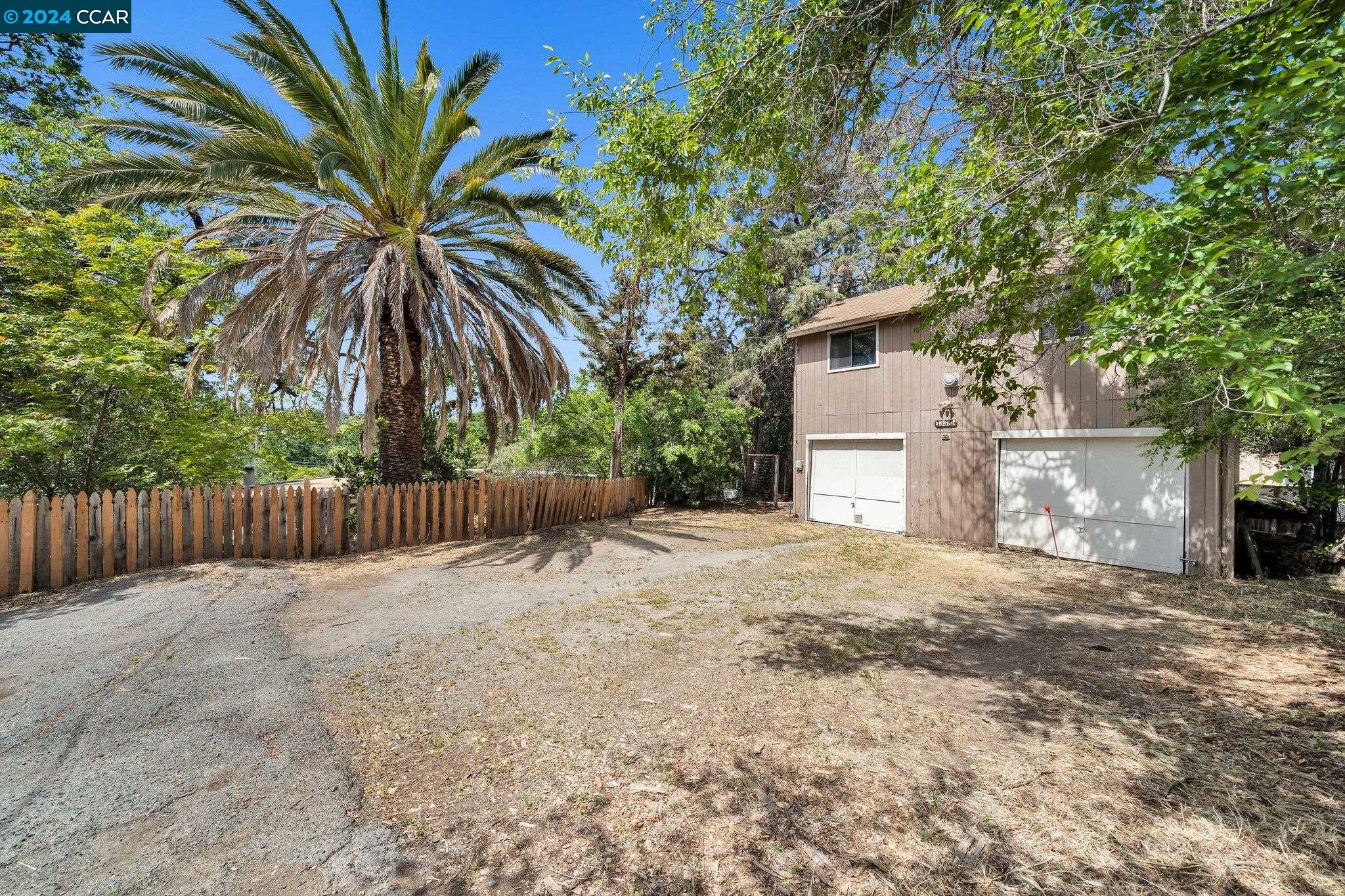 Welcome to an unparalleled opportunity in the heart of Walnut Creek, where charm meets modern convenience in an ultra prime location! Imagine owning a slice of old town allure, just a stone's throw from vibrant downtown, bursting with entertainment and fine dining options! Nestled on a sprawling 0.81 ACRE LOT zoned R-20, this delightful property features a cozy 2-bedroom, 2-bathroom home and an ADU that boasts 3 bedrooms and 2 bathrooms. The possibilities are endless—whether you choose to renovate the existing structures into your dream abode or embark on a new adventure by applying for an SB 9 parcel split to create multiple homes with their own ADUs. Keep one for yourself and sell the other to ease your financial journey! With highly rated Walnut Creek and Acalanes School Districts at your doorstep and an incredible opportunity for rental income, guest accommodations or an inspiring workspace, your future is not just bright—it's brimming with potential! Plus, with downtown Walnut Creek a mere 0.8 miles away and convenient access to BART and freeways, your dream lifestyle awaits!!