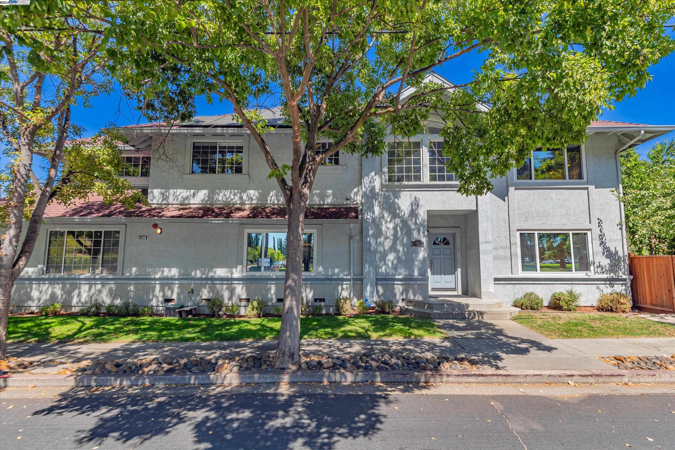 Welcome to this exquisite corner lot home, nestled in the highly desirable Southside of Livermore. This beautifully updated residence offers a perfect blend of elegance and modern living. It has soaring vaulted ceilings and lots of natural light pouring through the expansive windows. The living and formal dining areas are sophisticatedly designed with wainscoting and crown molding. Relax and unwind in the family room with a cozy fireplace. The gourmet kitchen has been meticulously remodeled with sleek stainless-steel appliances, marble countertops, an island, and ample cabinetry. Throughout the home, luxurious laminate flooring and newer two-tone interior paint add a contemporary feel. This home offers a grand master suite with high ceilings, a walk-in closet, and a master bathroom. Three additional bedrooms, a hallway bathroom, and a laundry room complete the upper level. The backyard has fruit trees, a new fence, and plenty of space for outdoor activities. With approximately $200K in recent upgrades, including a new HVAC system and a solar system, this move-in-ready home offers both comfort and efficiency. Located close to top-rated schools, parks, renowned wineries, outlet shopping, freeways, walking distance to downtown, shopping, dining, entertainment, and more.