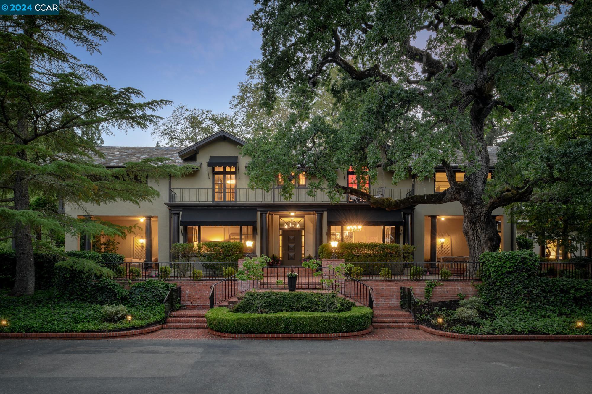 Presenting a landmark of Alamo rich with local history and timeless elegance. This legacy gated estate, situated on one of the most coveted streets of Westside Alamo, epitomizes luxury lifestyle. The estate’s distinctive classic elements & unique grandeur, demonstrated by elaborate millwork, period fixtures, & high ceilings, are evident throughout. Its floor plan spans two levels & includes numerous gathering spaces both casual & formal. The entry level offers 3 bedrooms each boasting privacy & space. The primary bedroom expands from a sitting room, & secondary bedrooms are generously sized. Multiple ancillary rooms on the second floor can serve as office or playroom space.Beyond the dining & living room, the family room features a wet bar & backyard access.The basement serves as a playroom. A sun parlor connects the kitchen & private ensuite bedroom or private living quarters with independent access. Entertainment space extends far beyond the walls of the residence: the 3.2± acre property is a verdant oasis that caters to private & social gatherings of impressive magnitude. Decorated by mature & manicured landscaping from its ethereal gated entrance to its sprawling & meticulously manicured lawn. The grounds are astounding. Auxiliary structures include pool house & detached bar.