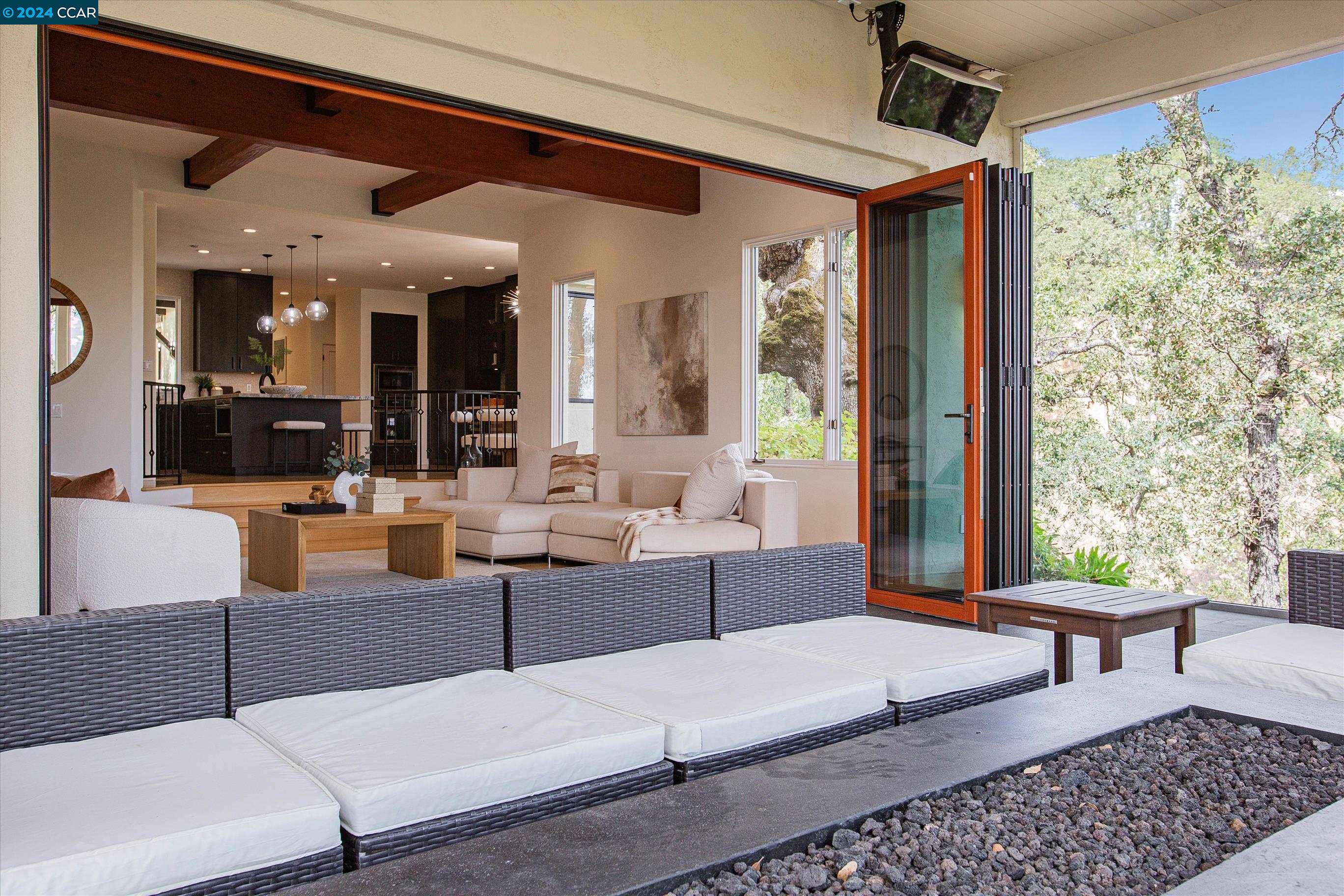 An Eagle in the nest! This one-of-a-kind Estate sits on one of the most private lots in Westside Alamo. Built by Howmack who paid attention to detail & floorplan. Surround yourself with natural beauty and serenity, where you have panoramic views of Mt. Diablo & Las Trampas Hills. Enjoy the Indoor/outdoor living space & expansive patio with glass panel railing, motorized screens, outdoor heaters and fans for easy entertaining. Smart home features include home theatre, nest system (3-phase), pool features and sonos system, blinds. Live in 5,346sf of luxury in this 5 bed/4.5 bath masterpiece. The garage & parking allows up to 12 vehicles. Kitchen remodeled in 2020 with large island, 2 panel-dishwashers, 2 ovens, microwave drawer, & built-in refrigerator. All Thermador appliances! Countertops: granite and quartz. DeWil's Custom cabinets, wine fridge, gas range with warming drawer, instant hot-water dispenser, hands-free chef's faucet & fridge. There are 2 additional kitchenettes: in the butler's pantry and in the Primary bedroom.  A 2nd entry door leads to an au pairs bedroom & butler's pantry. The primary bedroom offers a grand custom changing room. Resort to your secluded infinity-edge salt-water pool w/water features and solar. Your Oasis awaits you. Website:200Kirkcrest.com