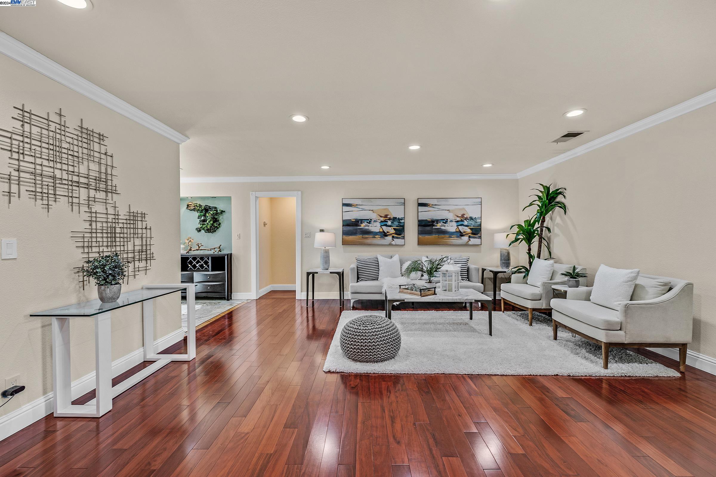 Welcome to 35079-35075 Sofia Court in Fremont, nestled on a serene cul-de-sac. This beautifully upgraded detached home seamlessly blends modern living with timeless elegance across 1,986 sq. ft. of total permitted space. Bathed in natural light, this 3-bedroom, 2-bathroom main residence offers 1,224 sq. ft. and showcases top-tier finishes throughout. The kitchen is a chef's dream with custom solid wood cabinetry and premium countertops. Luxurious Brazilian Rosewood solid hardwood floors add warmth and sophistication to every room. The bathrooms have been redesigned with high-end finishes, including designer fixtures, sleek vanities, and quality tile work, creating a spa-like retreat. The roof, fully permitted and replaced in 2022, ensures peace of mind. The fully permitted 477 sq. ft. ADU, 35075 Sofia Ct, built in 2022, offers 1 bedroom, 1 bathroom, and a full kitchen, generating $43,494.52 in rental income in 2023. The backyard features a 285 sq. ft. permitted storage room used as a party house, ideal for various purposes. This home is close to schools, parks, shopping, and major commute routes. Don’t miss this exceptional opportunity!