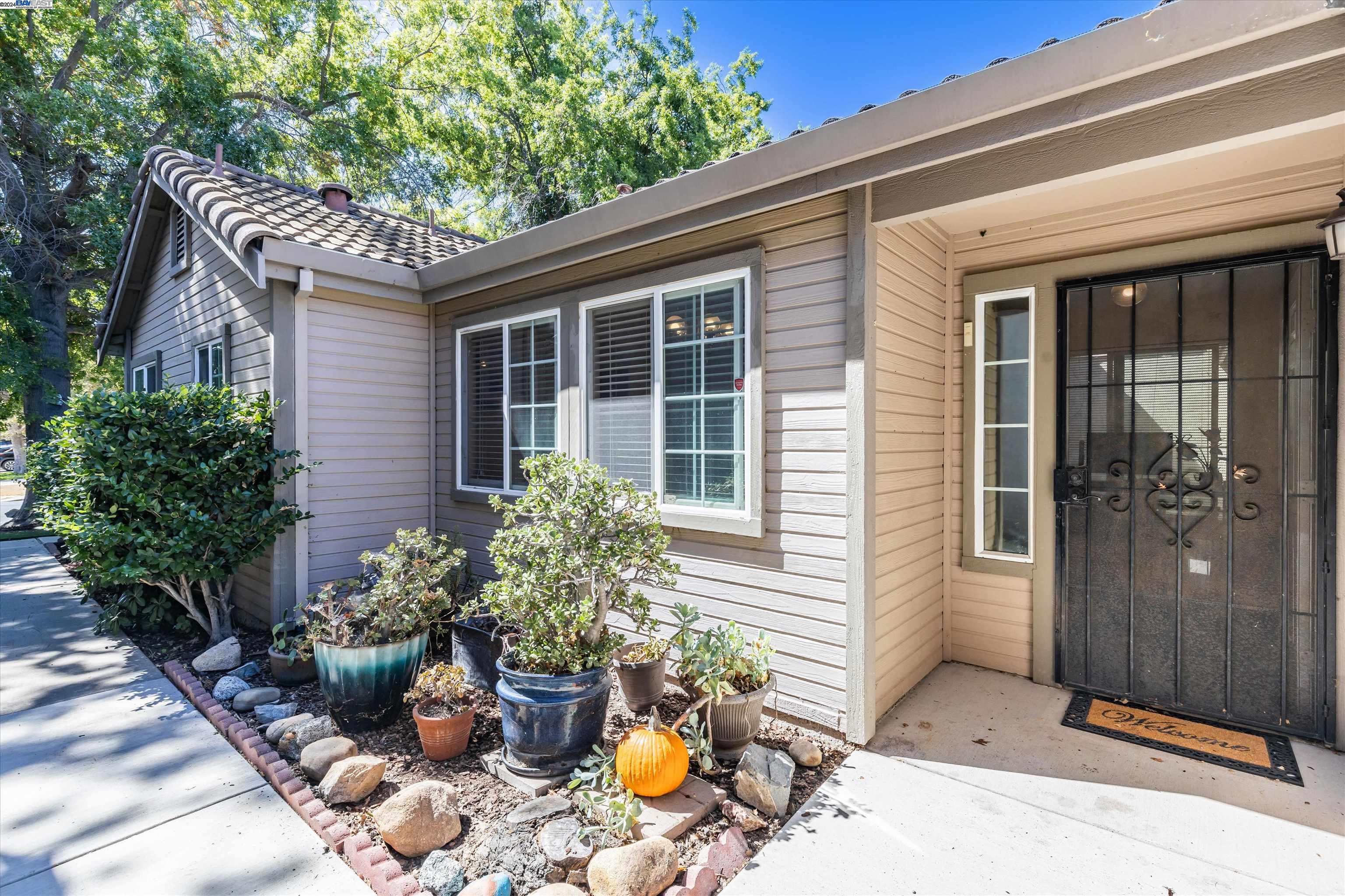 Discover your new home at 1816 Santa Fe St, Oakley, CA, where comfort, style, and convenience come together. This charming 3-bedroom, 2-bath home offers 1,330 square feet of well-designed living space, perfect for families or those seeking a peaceful retreat. As you step inside, you'll be welcomed by a bright and airy open floor plan featuring stone countertops, laminate flooring, and a cozy wood-burning fireplace with a brick surround. The kitchen is equipped with modern appliances, making it easy to whip up your favorite meals, and the layout ensures you're always part of the action. The property offers low-maintenance living, with a fenced yard ideal for relaxation, gardening, or outdoor gatherings. The attached two-car garage provides convenient parking and additional storage. Located in a desirable Oakley neighborhood, this home is close to schools, parks, and shopping, offering everything you need for a vibrant lifestyle. Don't miss this opportunity to own a beautifully maintained home that checks all the boxes!