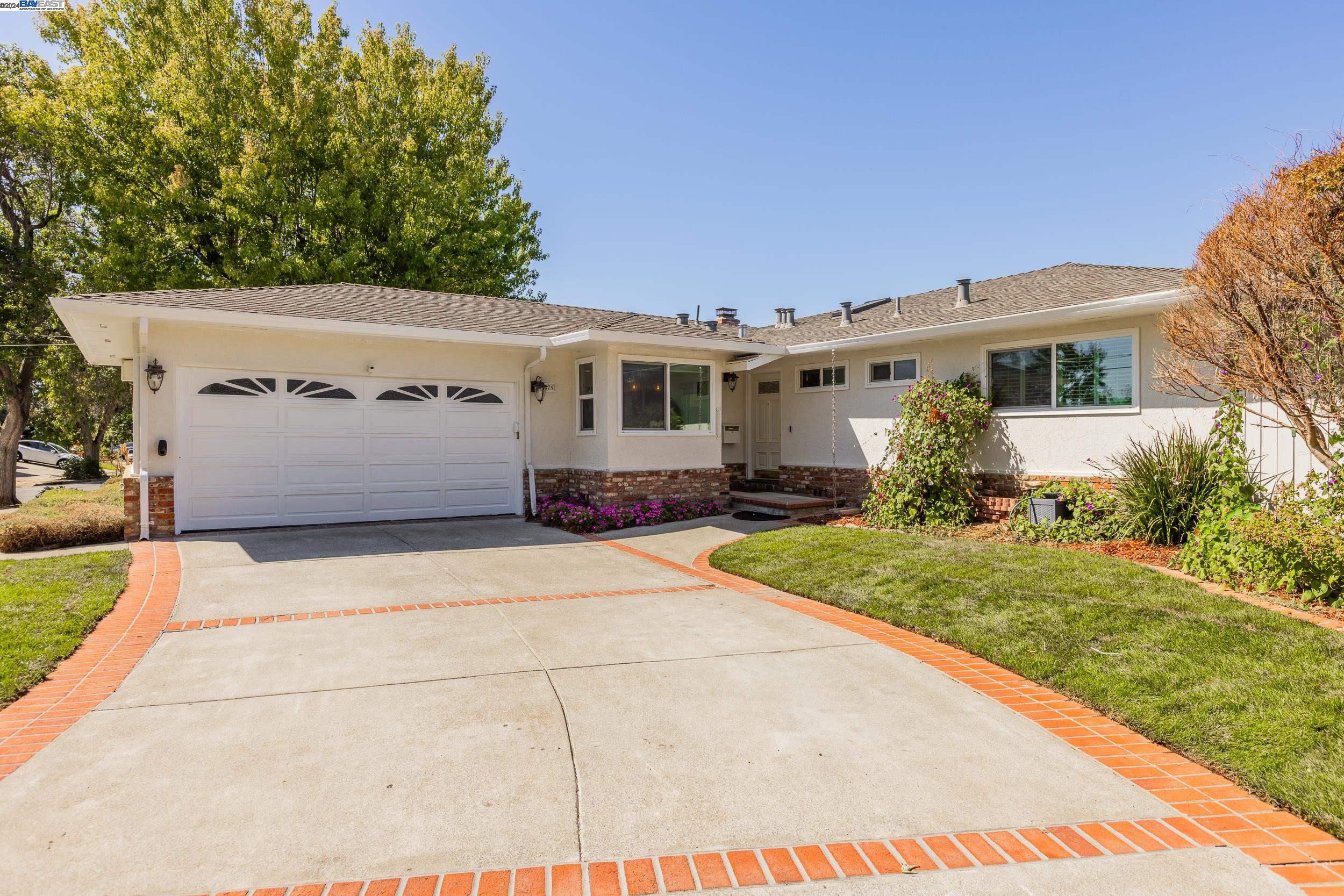 This charming, single-story home at 479 School St, Fremont, CA 94536 offers a well-appointed living space with over 1,900 square feet. Featuring four generously sized bedrooms and three fully updated bathrooms, this residence has been thoughtfully remodeled, including a modern kitchen perfect for entertaining. Situated on a spacious 8,300 square foot lot, the property boasts a large patio deck in the rear, providing an ideal setting for relaxation or hosting gatherings. Conveniently located near the historic Niles district, you’ll enjoy close proximity to unique shops, local restaurants, and easy freeway access. Nature enthusiasts will love being near the serene lake and community park, while families will appreciate the nearby schools, making this home perfect for both peaceful living and vibrant social experiences.