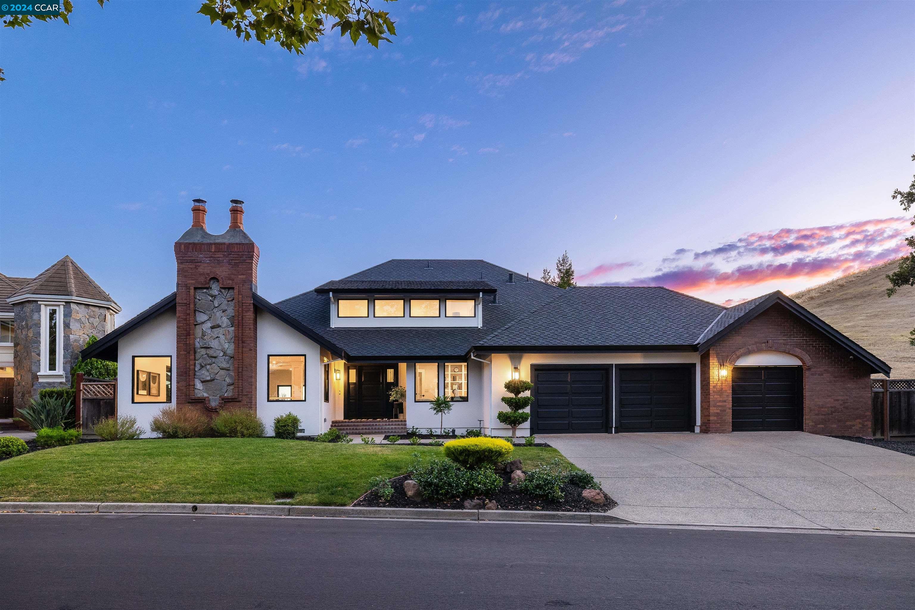 Foundation-to-roof $1.4 million renovation completed in Apr '24. Extraordinary celebration of contemp. design in Blackhawk. Masterfully executed craftsmanship. Attn to detail. Ultra-pvt. Light-filled. 3475+/-SF. 2 levels. Almost .25 acre. Borders open sp. Unobstructed Las Trampas Ridge & golf fairway views. 5 bds. 3.5 bths. Office/5th bdrm. Loft. Frmal living rm w/frpl. Frmal dining w/custom coffered wood ceiling. Fam rm w/Montego frpl, built-ins, wet bar. Chef’s kitchen w/custom cabinetry, black Titanium granite slab counters. Subway tile bkspl. 5x10-foot island/bkfst bar. Sub-Zero Designer Column Legacy & Wolf appls. 60-bottle wine frig. Maple hardwd & carpet flrs. Custom cabinetry. Smooth textured walls. Andersen wdws & French drs. Vaulted ceilings. Recessed LED lghts. Emtek black matte hardware. Primary suite. View balcony. En suite w/dual vanities. Custom cabinetry. Free-standing tub. Curbless shwr. Walk-in closet. Custom built-ins. 500 SF custom paver patio. Plumbed for gas frpit. Built-in bbq, leathered granite counter. New sod. Bordering redwds. Side yd for add’l gardens, playgd. Exclusive cul-de-sac. 3-car garage. EV charger. Near 2 championship golf courses, fitness ctr, Olympic-size pool. Tennis/pickleball cts. Blackhawk Plza. Dwntown. Freeways. Top-rated SRVUSD schls.