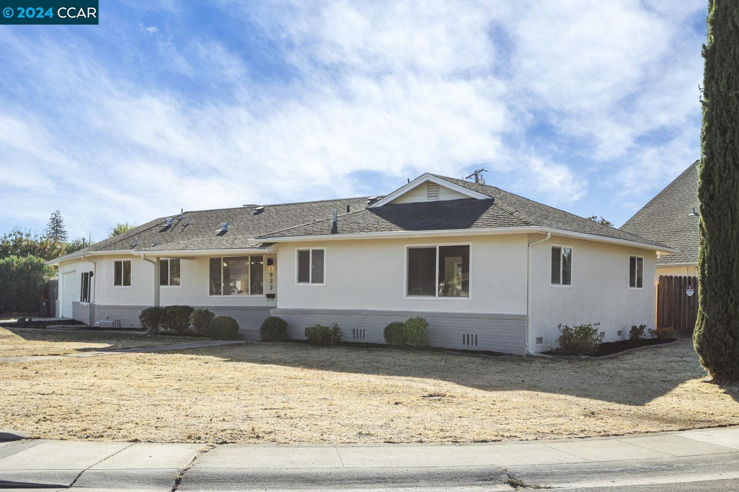 This gorgeous home is truly made for both entertaining and everyday living, with plenty of space and a great location in Stockton! Enjoy an inviting floor plan with two separate living spaces. The modern and completely updated kitchen showcases shaker cabinets with contrasting stone counters, designer tile backsplash and stainless appliances. This move-in ready home offers 3 bedrooms, 2.5 fully updated bathrooms, and 2 car garage perfect for fitness, hobbies, games or workshop. The primary bedroom not only boasts expansive living space, but the en suite bathroom is very elegant.  Right off the secondary living space you can walk outside to your sprawling backyard oasis, ideal for any gathering or gardening. This property is immaculate, spacious, and ready for new owners…Welcome home!