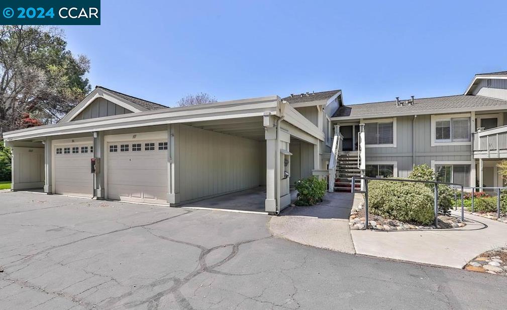 Enjoy sunsets & views of the serene surrounding hills in this wonderful Mariposa model. This Rossmoor gem is set above it all, tucked up the hill w/ a western outlook and offers a very private setting on the desirable Eastern side of the valley. Bright, updated eat-in kitchen has updated cabinets & Stainless-Steel appliances. Bright eat-in kitchen has updated cabinets with pullout drawers, updated lighting. Vaulted ceilings. The spacious living room/dining room has a vaulted ceiling with large windows that are covered with elegant plantation shutters. Primary retreat has skylight and access to a private balcony. Crown molding + high baseboard throughout. Updated  elegant Hall Bath, interior doors & carpet.  The carport is located next to the entry with a storage closet. Previous owner parked the car and golf cart in space. Plenty of guest parking nearby. This condominium is a must see to fully appreciate! Enjoy the Bay Area's première 55+ community featuring golf, gym, pickle ball, lawn bowling, clubs, classes/lectures and a multitude of activities.
