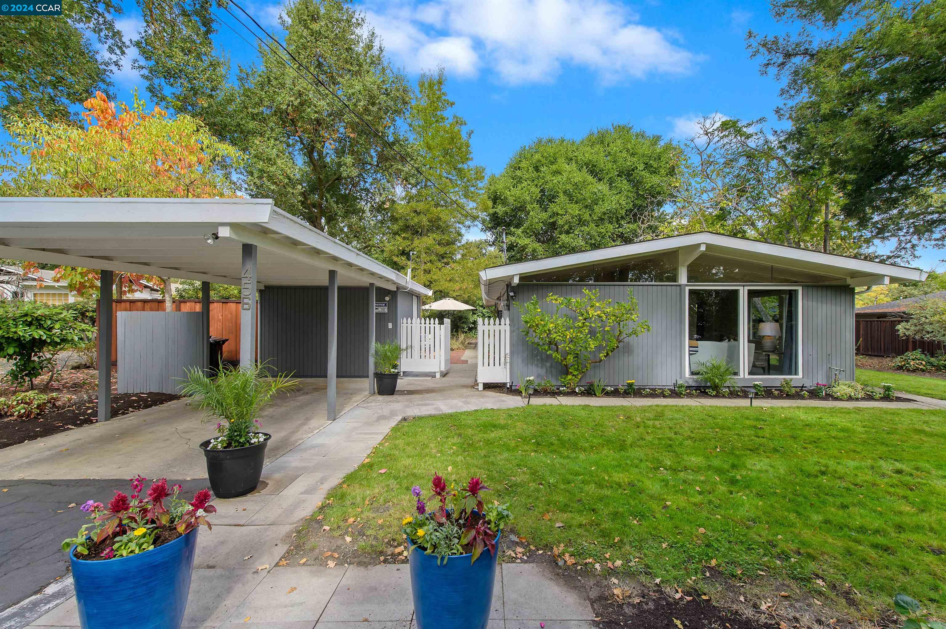 POTENTIAL EXPANSION OPPORTUNITIES! Go past Whytepark Lane from Bridge Rd & make a right onto the private Lane portion of Bridge Rd. SARANAP LOCATION! Plans for expansion in disclosure link, including room for pool. County/unincorporate Walnut Creek and no HOA. Charming, contemporary style, mid century modern bungalow. Single level with no steps to entry. Regular, level lot and mature trees. Seller has plans for expansion to share with new buyer. Wooded views. Secluded location, down a private lane. Indoor laundry. Bonus space in the detached building is perfect for use as an office, home gym, hobby area or simply as more storage. Covered parking. Close to Dewing Park Swim Club, Downtown shopping, grocery and many other convenient amenities. Charming neighborhood, well off of Olympic Blvd with many other custom and/or expanded homes surrounding. Transom windows, Vaulted ceilings, walls of glass and sun tunnels flood the home with natural light throughout. Stainless steel appliances, modern stone countertops, and spacious pantry. Newer roof. Laminate flooring, mini split heat/air and radiant heat flooring. Desirable schools - (Buyers to verify) Parkmead Elementary and choice of Acalanes or Las Lomas High Schools.