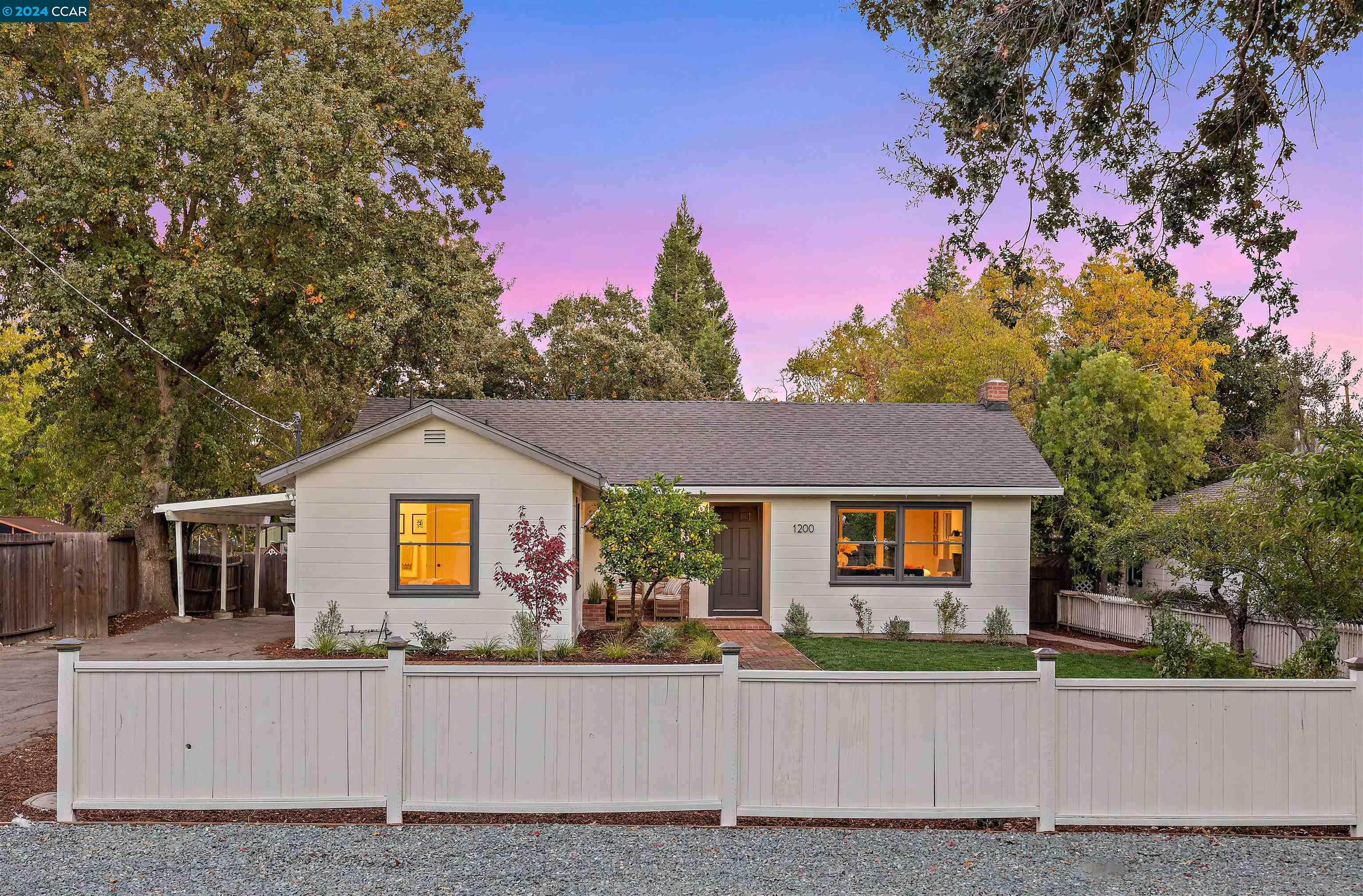 This fabulous single story ranch home located in the hidden gem neighborhood of Saranap (Location! Location!! Location!!!) offers expansive newly landscaped yards and peaceful, private outdoor spaces. Inside this beautifully renovated home you will find refinished hardwood floors, new paint inside and out, completely remodeled bathrooms, designer picked tile, lighting and fixtures. The kitchen has high quality cabinets, stainless steel appliances and skylight perfect for cooking and entertaining. The large sunlit living room and dining area has a welcoming fireplace and opens to the expansive deck and yard. The primary bedroom is a peaceful retreat with new en-suite bathroom, while the second bedroom is a nice size and shares the updated hall bathroom. There is a large versatile third bedroom, currently set up as a family room, that has adjoining laundry area and walk-in closet. The yards have a new expansive wood deck, new landscaping, veggie beds and fruit (Meyer Lemon, Orange, Plumb, Asian Persimmon), trees making it a private oasis. Don’t miss the large shed for potential office conversion.  Enjoy the close proximity to downtown Walnut creek, top-rated schools and nature trails. New roof, landscaping, deck, fixtures, bathrooms, sliding doors and more. OPEN SUN 12-3:30.
