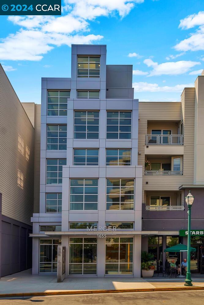 This unit is a cut-above owing to its location in the complex and extensive upgrades. Overlooking the pool and facing West, it's filled with light. The floors are a rich Brazilian cherry, and the interior walls have been painted a fresh white. There are new entry and diningroom lights, and the Seller has spent nearly $7,000 adding 15 new recessed LED lights in the living room, and bedrooms. All in Nov/2024 with the HOA’s approval and a finaled City Building Permit. The light/fans in two bathrooms are new.  There is an extra-large patio; container gardening anyone? or enjoy the afternoons lounging on your outdoor furniture.  Wall to wall carpets in the bedrooms are new and cushy! The kitchen is great for the home-chef with lots of cabinet space, stone counters, bright lighting, a SubZero fridge and stainless-steel gas R/O. The separate storage space is conveniently down the hall. Had a long day? Come home and soak in the primary bath's deep tub. The tub in the second primary suite's bath is new. All this luxury in the heart of Downtown Walnut Creek at one of the most desirable condominium complexes with exceptional common area amenities and a high walking score. It's a lifestyle choice, come savor what Downtown Walnut Creek has to offer. And commuters, BART is about 2 blocks away.