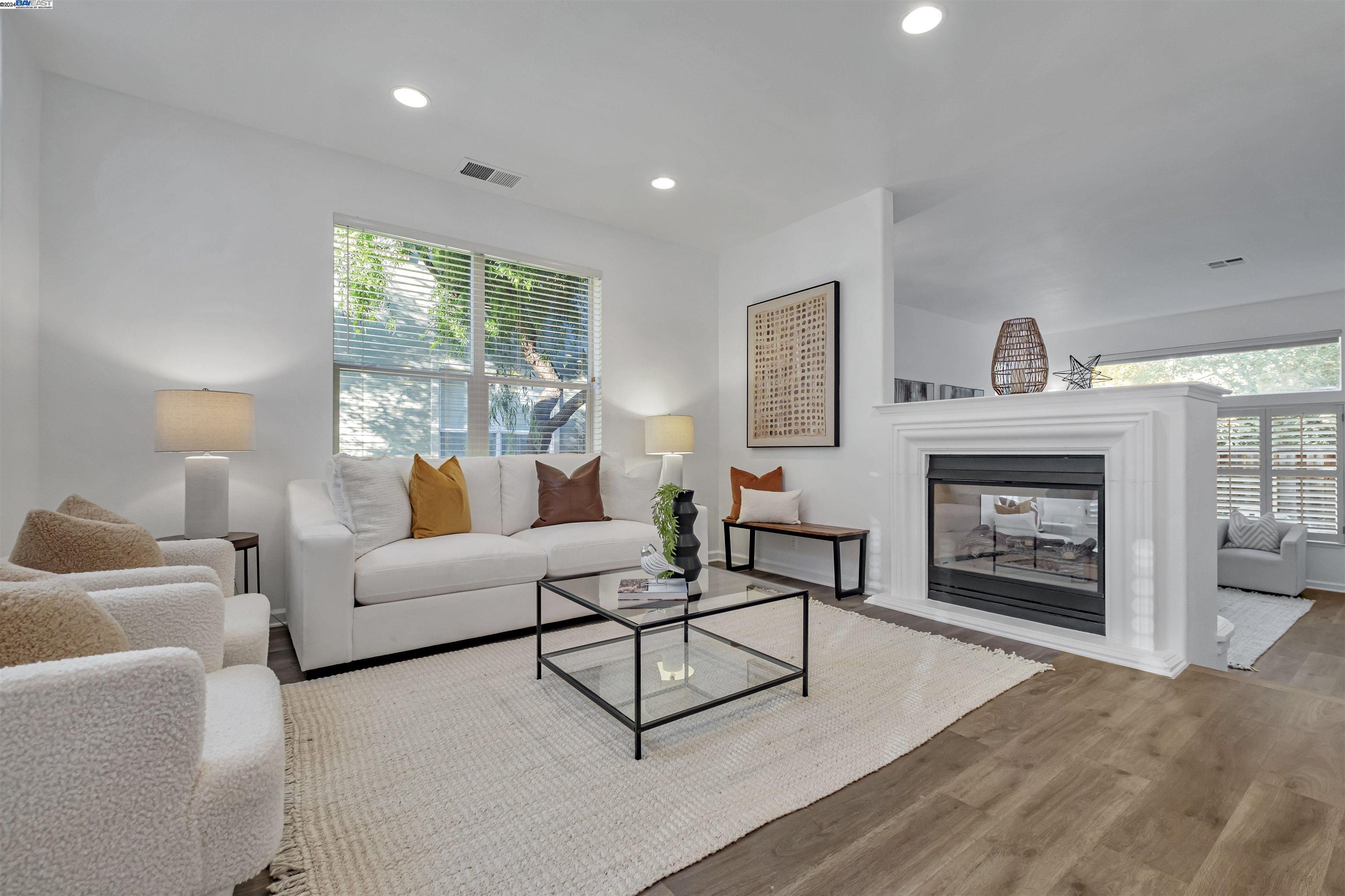 Welcome to Your Dream Home in Prestigious Palomares Hills! This stunning, fully renovated gem offers 3 bedrooms, a versatile loft (convertible to a 4th bedroom), and 3 remodeled bathrooms, including a convenient downstairs bed and bath. The open floor plan connects living and dining areas with a cozy two-way fireplace—perfect for gatherings or quiet evenings.  The chef’s kitchen features a walk-in pantry and charming eat-in area, while the luxurious primary suite boasts a modern, doorless walk-in shower for a spa-like retreat. Step outside to your fenced backyard oasis with a tranquil fountain, deck, and no rear neighbors—a serene space for relaxation or entertaining.  Enjoy top-tier community amenities: pools, tennis/basketball courts, parks, and scenic trails. With its amazing location near BART, freeways, and Downtown Castro Valley, this turnkey home won’t last long!!!