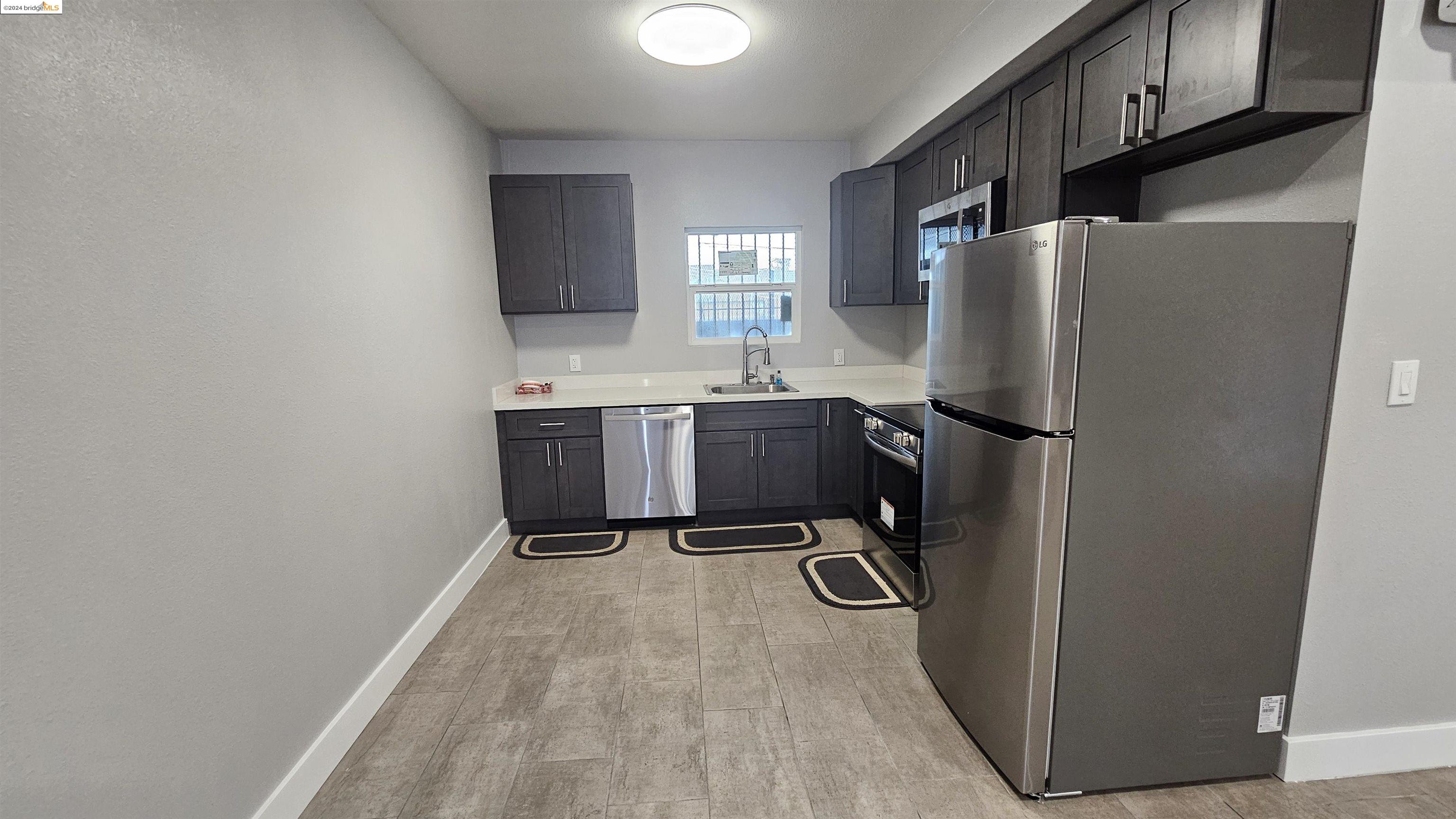 Detail Gallery Image 20 of 22 For 1625 International Blvd, Oakland,  CA 94606 - 3 Beds | 1 Baths