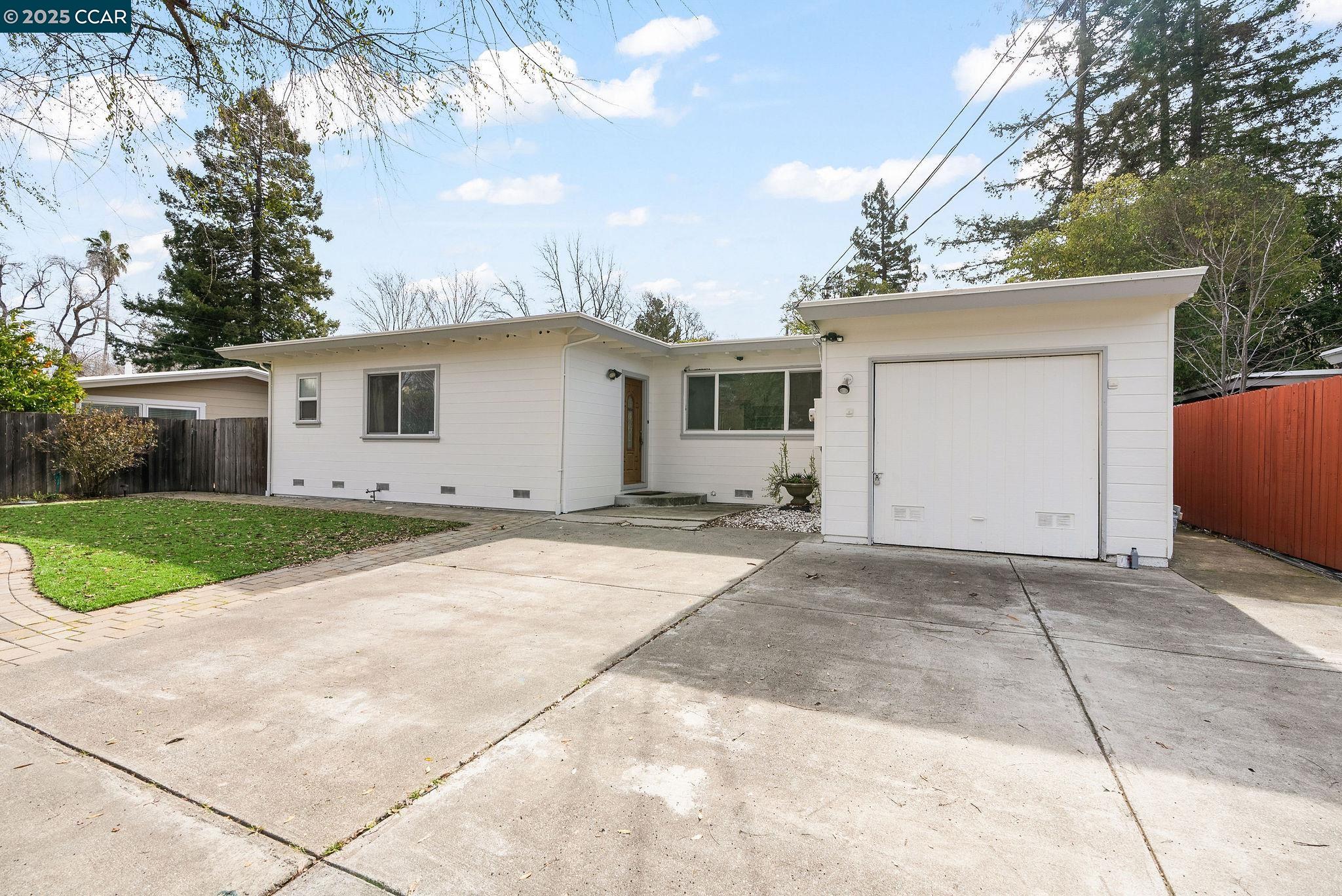 This warm and inviting 4-bedroom, 2-bath single-family home quietly rests in the heart of Walnut Creek. This property has paid off solar so get ready to enjoy very low Pg&e bills! Sunlit living areas showcase gleaming hardwood floors, while a cozy wood-burning fireplace in the living room offers the perfect spot for relaxation or entertaining. The large front yard and spacious backyard provide ample gardening, play, and an alfresco dining room. Enjoy unbeatable convenience with quick access to Walnut Creek BART, Interstate 680, Broadway Plaza, Downtown Walnut Creek, shops, restaurants, and top-rated local schools. This home checks every box if you’re seeking a peaceful retreat without sacrificing proximity to urban amenities. Don’t miss out—come see it today!