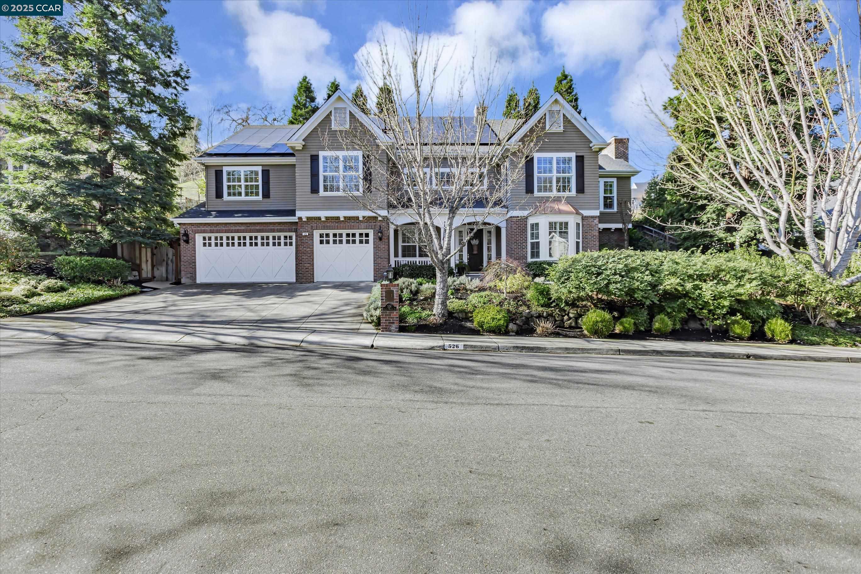 An opportunity to be part of one of Alamo's most sought after neighborhoods! Beautiful Branagh built colonial with farm house appeal. Step into the airy foyer with its soaring ceilings and lots of light. A guest bedroom/bath provides privacy. The main floor is expansive, living room, dining room, study, family room, kitchen, two bedrooms, laundry and powder bath are here. There are hardwood floors, recessed lighting, beautiful crown moldings and wainscoting and tons of windows. The remodeled kitchen, open to the family room has a Viking 6-burner stove and double ovens featuring a "French door". Farmhouse sinks, with quartzite counters.  The over-sized island is great for entertaining. The spacious primary suite is like a retreat, on its own floor, away from the activities of the day. Outdoors, a fireplace, built-in BBQ and pizza oven, along with the impressive pool & spa make entertaining easy! A gardener lives here! There are fruit trees, a veggie garden, and "English" style landscaping with flowers  galore! Owned solar for home and pool. Be part of this charming, tree-lined neighborhood of 26 homes with the best neighbors!