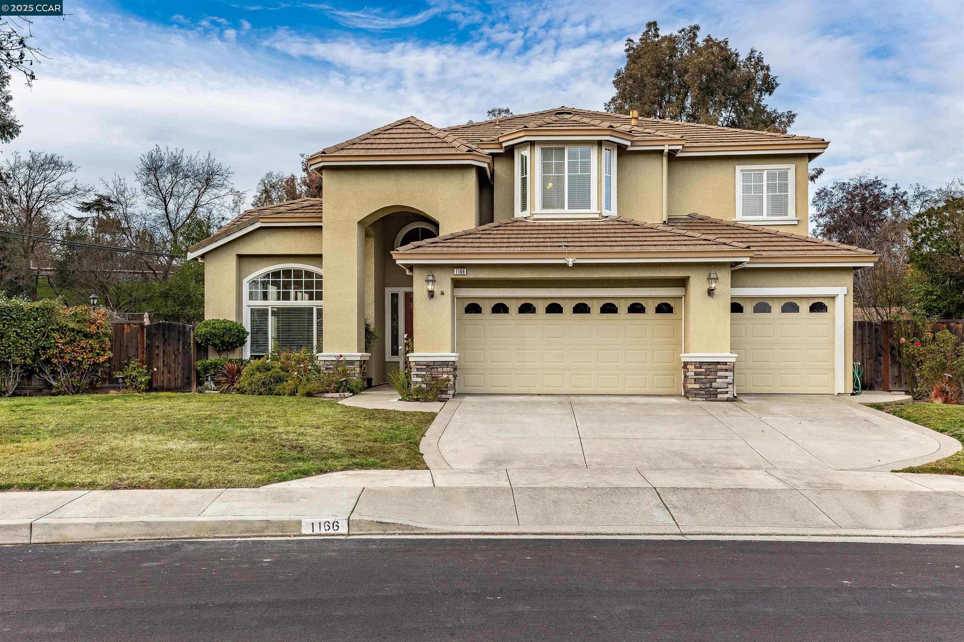 Price Improvement! Tucked away on a secluded court, this 5-bedroom, 3-full-bath home offers the ideal blend of comfort, convenience, and fun! The flat lot is perfect for entertaining, featuring a heated pool and spa where you can relax or host unforgettable gatherings year-round. The large yard is adorned with fruit trees and roses, adding charm and serenity to the outdoor space. Inside, you’ll love the soaring high ceilings leading into the updated kitchen with quartz countertops and thoughtful layout, including a rare first-floor bedroom and bathroom—ideal for guests or flexible living options. The 3-car garage provides ample space for vehicles, storage, or hobbies. Commuters will rejoice at the unbeatable location—just a short walk to the BART station for easy access to the Bay Area. Enjoy the ability to attend top-rated schools: Indian Valley Elementary, Walnut Creek Intermediate, and Las Lomas High School. Plus, the home is nestled in a beautiful neighborhood court near shopping, dining, and freeway access. Don’t miss this opportunity to live in a home that offers it all—style, convenience, and a backyard oasis. Come see 1166 Briarwood Way and make it yours just in time before spring and summer!