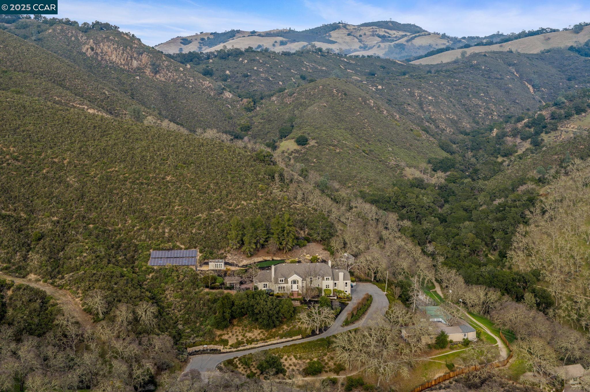 Welcome to the Crown Jewel of Diablo,Paso De Diablo, Nestled at the Base of Mt. Diablo.This Once-in-a-Lifetime Estate Redefines Elegance&Privacy w/8,343 sqft Main Residence featuring 6 Bdrms w/En Suites Designed to Provide Every Comfort&Luxury.Grand Entryway Sets the Stage for Architectural Awe that Defines the Estate.Residence Features Formal Dining Room,Formal Living Room,Great Room w/Soaring Ceilings&Views,Media Room w/Temp Controlled Wine Storage,Gourmet Chef’s Kitchen w/Dual Islands,2 Offices,2 Laundry Rooms&Spectacular Primary Retreat.The Estate’s Grounds Offer Equally Impressive Amenities Designed to Blend Seamlessly into the Natural Landscape.Sparkling Pool&Hot Tub,Built in BBQ,Outdoor Lounge&Dining Spaces Provide a Remarkable Setting for Relaxation;Pool House w/1Ba,2 Changing Rooms;Greenhouse;Sport Court&Recreation Area;Carriage House w/Oversized Bonus Room—ideal for Entertaining,Yoga,Home Gym;Additional Garage Spaces,Workshop&Storage.This Exceptional Estate Offers Everything you need for Modern Living.Nestled at the Base of Mt. Diablo with Sweeping Panoramic Views,this is a Rare Opportunity to own a Property that Embodies Luxury, Tranquility&the Best of Both World-Class Design&Nature’s Splendor.Come Experience this Exclusive Sanctuary,Paso de Diablo.