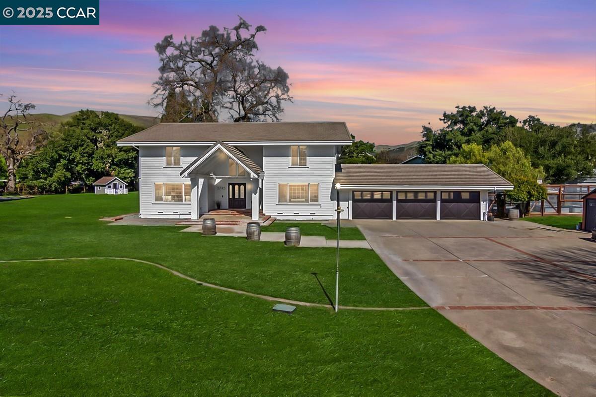 Idyllic gated estate in Tassajara Valley mins from Blackhawk Plaza offers abundant opportunities to create a luxurious country lifestyle. 3890+/-SF on 2.87+/-level, fully fenced acres bordered by redwds & laurels. Perfect setting for equestrian enthusiasts, gardeners, vintners, a multi-family compound, incoming-producing ADUs & resort-inspired outdr living. Updated contemporary farmhouse design. Generously sized rms. 5 bds. 3 bths incls main-level bdrm/office. Elegant formal living & dining rms. Chef’s kitchen w/quartz counters. Stainless appls. Walk-in pantry. Family rm w/gas Roman clay frpl. Fresh int/ext paint. European white oak hardwd flrs. Soaring ceilings. Oversized view windows. Touchscreen/app controls for HVAC, sec alarm, generator, frt gate, garage & ft drs.  Custom built-ins, contemporary iron staircase railing, automated blinds, LED lights, crown molding on exposed beams. 2 add’l access gates to property. Main-level laundry w/sink. 3-car garage. New drs. Tesla charging station. Tankless wtr htr. Generac whole-house generator. High-producing well. Upgraded UV sanitation & salt systems. Multiple fruit trees, raised garden bds, chicken coop. Open-air barn, corral. Near historic One Room School House. SRVUSD schls, Livermore Wine Country, downtown, freeways, Mt. Diablo.