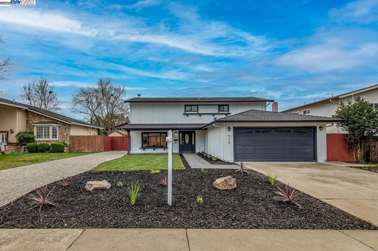 It’s all done inside and out!! Beautifully remodeled  two-story home in Livermore offers a bright, open floor plan with abundant natural light throughout! The heart of the home is the kitchen! Your new kitchen features modern stainless KitchenAid appliances, modern cabinets, gold accents, quartz countertops, double oven, a full wall backsplash, and bar top seating, plus a large walk-in pantry. Wow! Still ample room for storage and cooking fun! A formal dining area and additional dinette space provide plenty of room for family and friendly gatherings. The living room boasts vaulted natural wood beam ceilings and a stunning and stylish fireplace and easy access to your newly landscaped backyard. Adjacent to the living area is a stylish half bath for added convenience. Upstairs, the spacious main bedroom suite includes a private office and/or lounging area. Spacious bathroom area includes oversized walk-in closet with gorgeous flooring and custom organizers. Additional bedrooms are all bright and generously sized, each with closet organizers! Newly landscaped backyard has a paved patio and expansive grass area, perfect for outdoor entertaining! Enjoy a two-car garage with epoxy floors & storage.  A perfect blend of style and comfort! Enjoy Rhonewood neighborhood amenities.