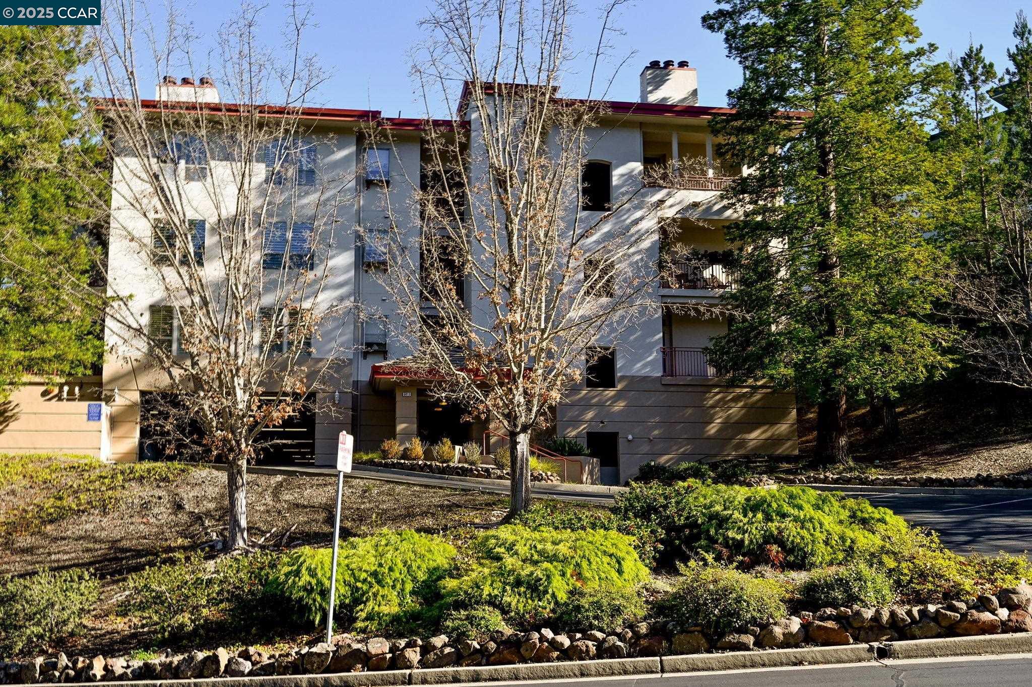 PRICE IMPROVEMENT! GO SHOW!! INCREDIBLE VIEWS--SURPASSED ONLY BY PERFECT SERENITY! THIS UNIT HAS 2 CAR SPACES, GOLF CART SPACE AND STORAGE UNIT. ONE OF A KIND STUNNING PENTHOUSE NOW AVAILABLE AT PINNACLE RIDGE. THIS END UNIT PENTHOUSE IS ABSOLUTLEY PRISTINE AND SHOWS LIKE A MODEL. GORGEOUS APPOINTMENTS AND UPGRADES THROUGHOUT TRULY SET THIS HOME APART. THE PENTHOUSE SHOWCASES JUST UNDER 1900 SQ.FT. OF OPEN, SPACIOUS AND DRAMATIC LIVING. YOU'LL LOVE THE NEWLY REMODELED ON TREND STYLISH KITCHEN. RELAX IN THE INVITING TRANQUIL PRIMARY SUITE FRAMED WITH A WALL OF WINDOWS OVERLOOKING THE WOODED VEGETATION, HILLS AND MOUNTAIN TOPS. THE EXECUTIVE OFFICE FEATURES BEAUTIFUL B/I CABINETS, SHELVING AND DESK. ENTERTAIN IN  THE FORMAL DINING AND LIVING ROOM AREA WHICH OPENS TO THE OUTSIDE PATIO. COCKTAILS ANYONE? COZY UP TO THE 2 WAY FIREPLACES WHICH ARE A FOCAL POINT WITH TIERED MANTELS AND MARBLE HEARTHS. CONVENIENT LAUNDRY ROOM WITH CABINETRY AND SOAKING SINK. THIS IS A SPECIAL PROPERTY. NOT TO BE MISSED!!