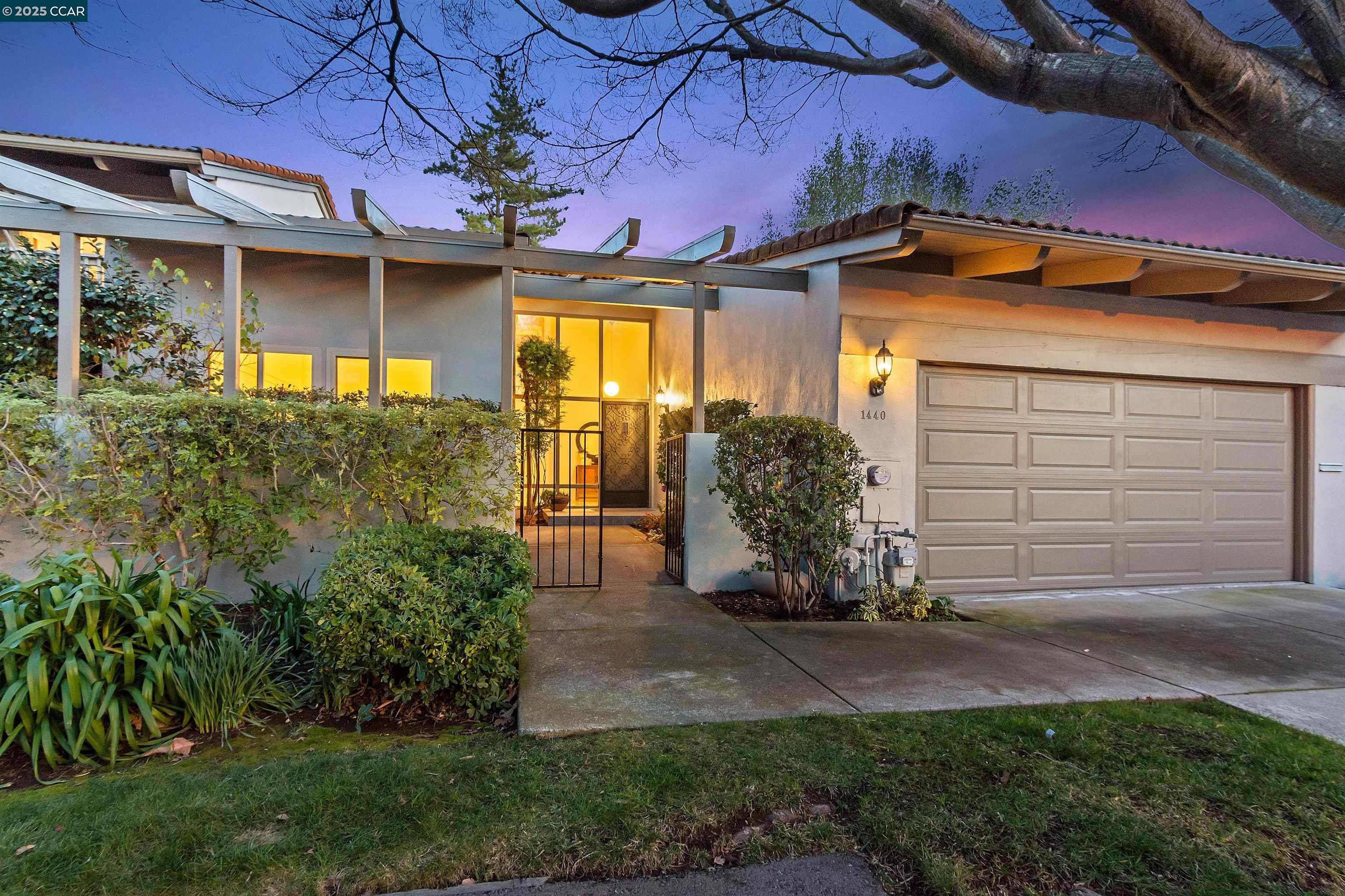 This mid-century “feel” single level 2-bedroom, 2-bathroom, 1596 sq ft townhouse in a prime, Walnut Creek location has a very convenient floorplan. The updated kitchen with heath tile backsplash is perfect for cooking enthusiasts, while the dining area and cozy living room with a fireplace and vaulted ceilings make entertaining easy. The spacious primary suite includes a charming nook ideal for a home office and offers outdoor access. Freshly painted throughout, the townhouse features a private backyard deck for outdoor relaxation and dining, as well as a 2-car garage with ample storage. Conveniently located in a well-managed HOA with pool and low dues near John Muir Hospital, Heather Farms Park, BART, and downtown Walnut Creek’s top shopping and dining, this home blends comfort and convenience effortlessly.