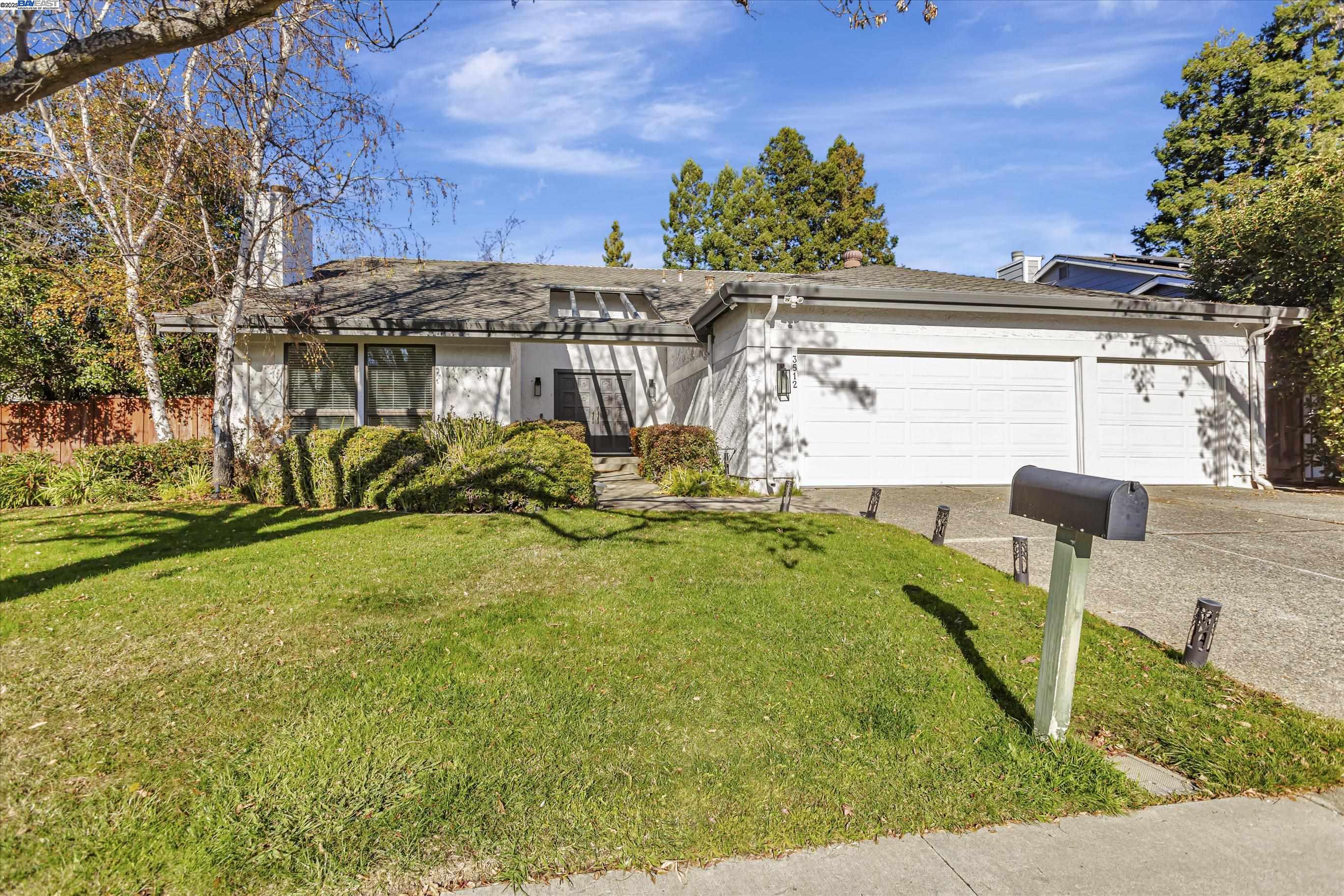 Highly Desirable 4 bed/2.5 bath single-story home on a prime corner lot in Walnut Creek’s sought-after Northgate neighborhood. Open floor plan with vaulted ceilings. Cozy den features a brick fireplace and built-in shelving. The living room highlights a stunning brick fireplace. Dining room has vaulted ceilings and a sliding door to a private deck. Spacious family room connects to an updated kitchen with stone countertops, built-in cooktop, double ovens, fridge, pantry, and island seating for three. The primary suite offers a sliding door to a private deck, walk-in closet, and ensuite with soaking tub, stall shower, and dual sinks. The backyard shines with two large decks, a grass area, and mature landscaping. Additional features: wood laminate flooring, luxury shutters, closet organizers, interior laundry, and a three-car garage with custom storage. Close to parks, schools, trails, and minutes from HWY 680/downtown Walnut Creek.