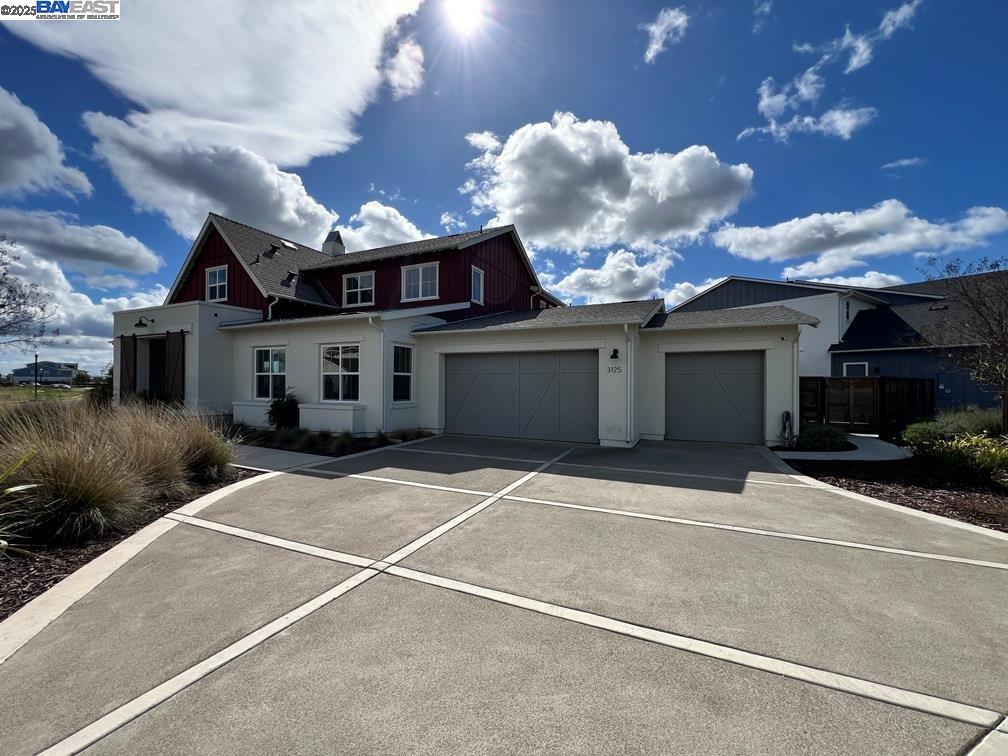 This stunning home is the epitome of elegance and comfort, offering breathtaking panoramic views and over 1000 miles of waterways right from your backyard private dock. This gorgeous home features over 300K in builder options. Located on a premium lot with the long views of the lake. The newly landscaped rear yard with stamped concrete, new plants, fencing, and grass area are perfect for entertaining. The gorgeous wood floors add a touch of elegance and the kitchen with quartz counters, Kitchen Aid gas range and oven, a built-in oven/microwave,  huge walk in pantry, and upgraded cabinets will please the Chef of the house. There are 2 primary suites both offering panoramic views. The first floor suite offers a large tub, Gorgeous stone shower and a walk-in closet. The second floor offers a huge bonus room with views. The upstairs suite offers a large shower, dual sinks and a walk-in closet. The other bedrooms each have their own full bath room. There is dual zone heating and A/C and 2 laundry rooms, one upstairs and one downstairs. The community has the Island Camp (the private club) which offers so many amenities, including a clubhouse, gym, bar and more.