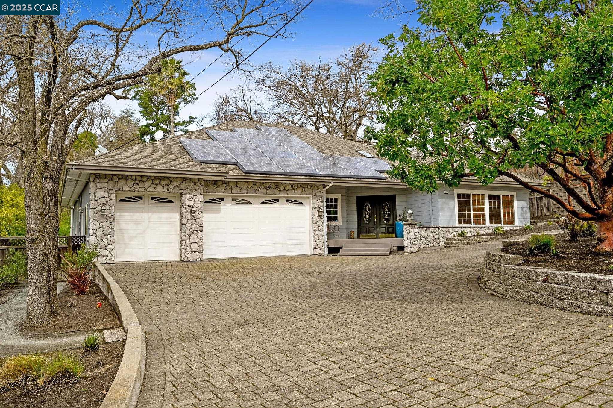 Wonderful Walnut Heights single story with terrific large open rooms and a wonderful flow for entertaining. HUGE Chef's kitchen with two ovens, gas range, Sub Zero refrigerator, two sinks, plentiful storage and counter space as well as a great pantry and separate desk nook area. Spacious and inviting formal living room adjoining the dining room with wonderful built-ins, the large family room is open to the kitchen and highlighted by both a fireplace and sliding doors that exit to the private, low maintenance backyard entertaining pagoda complete with TV wall, heaters and a fan large enough for a crowd. The large primary bedroom has a walk-in closet completely built out with custom storage and opens onto the hot tub on the back deck and the en suite bathroom is complete with dual sinks, a wonderful shower and separate soaking tub. It's got great access to downtown Walnut Creek, the Open Space and an easy walk to Walnut Heights elementary school. Don't forget the circular drive and extra large three car garage nor the wine cellar with room for 800+ bottles of your favorite wines and a Solar System that transfers with the house!