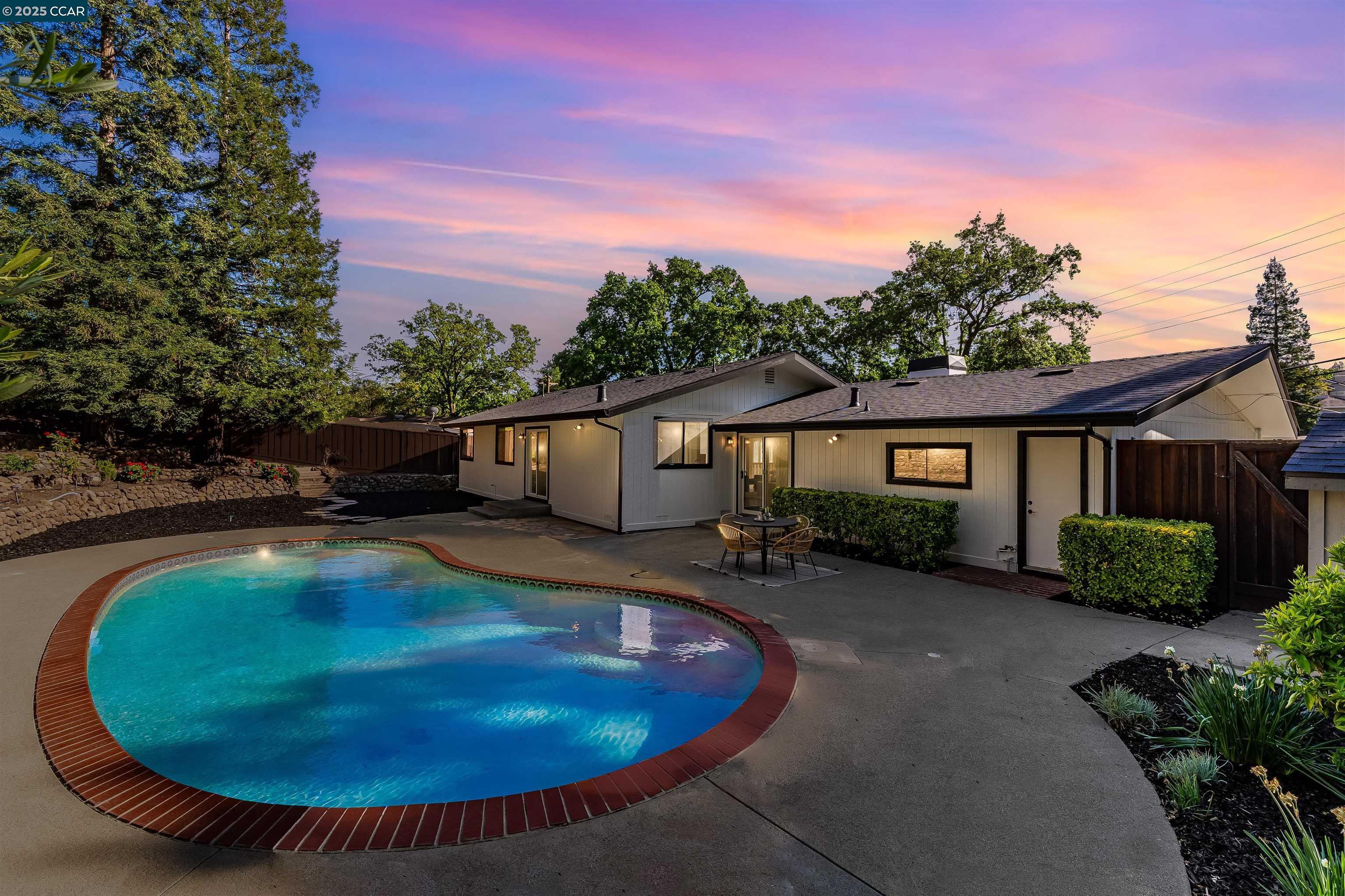 Charming Ranch-Style Luxury Home with Pool This updated rancher features a modern kitchen, remodeled baths, and mahogany wood floors throughout. The spacious master suite includes a walk-in closet and a luxurious bath with an oversized shower. Enjoy the private yard with fruit trees, a veggie garden, and sitting areas overlooking the sparkling solar-heated pool. Additional highlights include RV parking potential, ample driveway space, and a fully fenced front yard. Conveniently located near downtown with top-rated schools, this home offers comfort and charm. Contact us for more details or to schedule a tour!