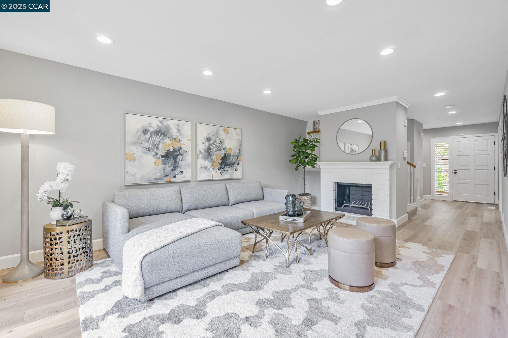 OPEN HOUSE FRI 3/14 FROM 5PM-7PM, SAT 3/15 & SUN 3/16 FROM 11:30AM-5PM! Located in the heart of charming Alamo, this townhome has been beautifully updated throughout showcasing its modern elegance. The bright and open floor plan is enhanced by engineered hardwood floors, large windows, and high-end finishes throughout. The kitchen has been updated with stunning quartz countertops, new cabinets, and stainless steel appliances. Designed for both comfort and entertaining, the dining room opens up to the living room with fireplace, creating a warm and inviting atmosphere, great for hosting friends and family. The secondary bedroom with ensuite bath offers privacy and convenience. Step through the sliding doors off the dining room onto the spacious back patio, where lush tree views create a private retreat. This serene outdoor space is perfect for BBQing, entertaining, or quiet evenings at home. This townhome offers easy access to top-rated schools, scenic trails, shopping, dining, and freeway access. With a detached two-car garage and ample storage, this is a rare opportunity to enjoy turnkey living in one of the Alamo’s most desirable communities!