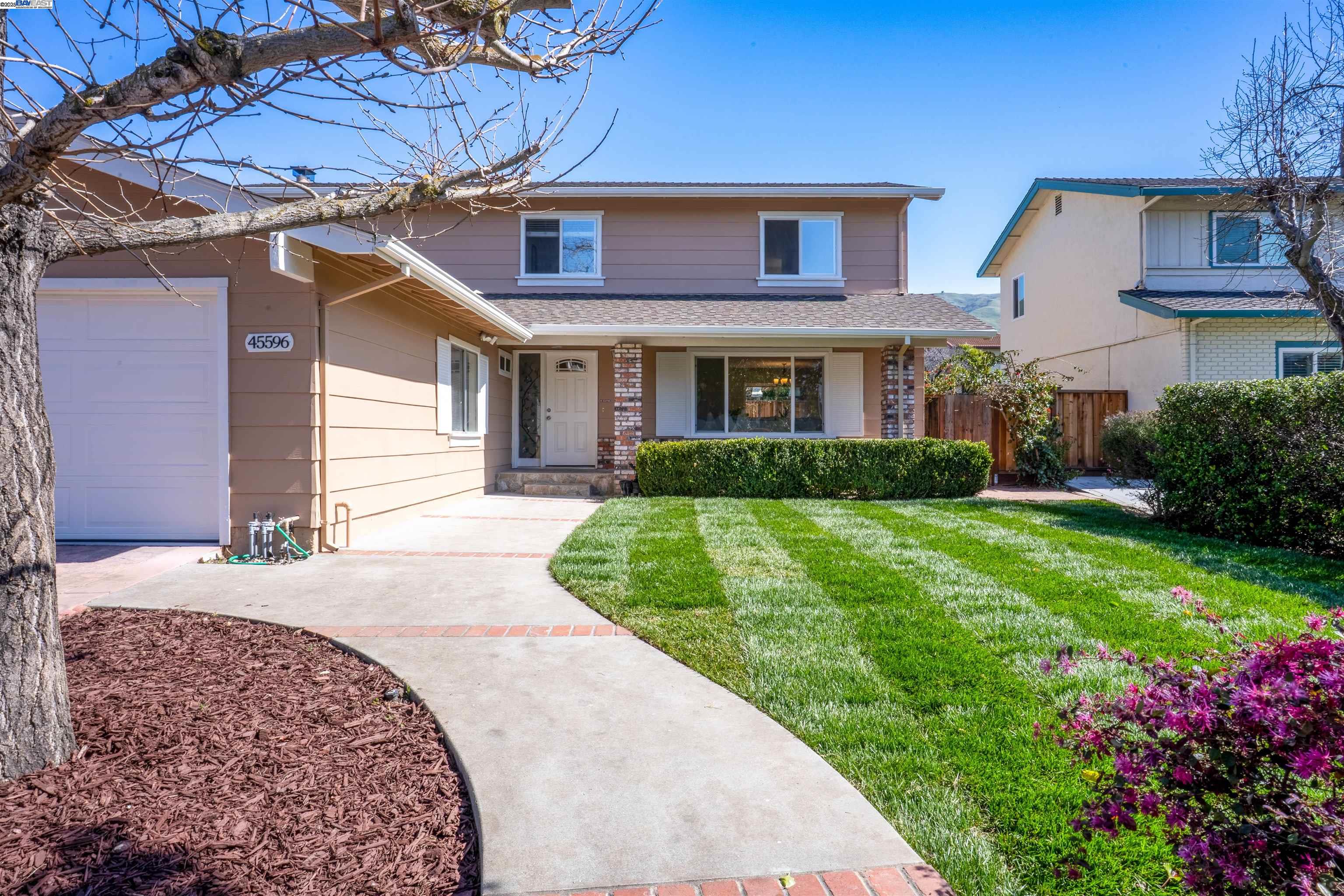 Welcome to this stunning 2-story, 5-bedroom, 2.5-bathroom home in the highly sought-after Weibel neighborhood! Ideally located for excellent schools, a shorter commute, and an exceptional quality of life, this light-filled home offers both elegance and comfort. Step inside to a bright and airy living room, complemented by a formal dining area. The elegant SPC flooring is both stylish and easy to maintain. Central AC and heating ensure year-round comfort. The beautifully updated kitchen features granite countertops, recessed lighting, a powerful range hood, and a picturesque window with serene Mission Peak views. The spacious family room is perfect for entertaining, while a convenient downstairs bedroom and half bath provide the ideal space for guests. This home is filled with recent upgrades, including newly renovated bathrooms, updated flooring, recessed lighting, new interior doors, and fresh interior paint. Located within the top-rated Weibel Elementary, Horner Middle, and Irvington High School district, this home also offers easy access to freeways, the Warm Springs BART station, Mission Peak trails, shopping and dining. Don’t miss this incredible opportunity to own a beautifully upgraded home in one of Fremont’s most desirable neighborhoods!