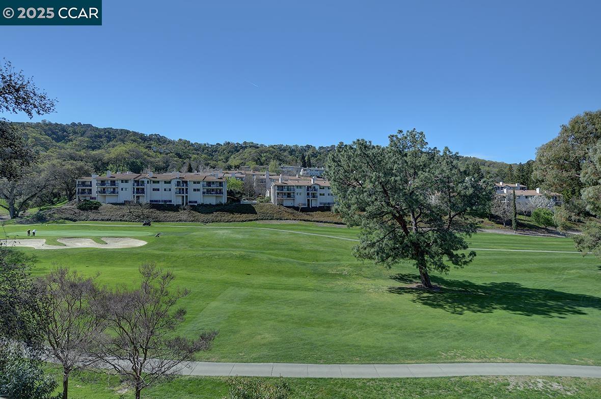Perched above the 12th hole of Dollar Ranch Golf Course, this stunning Galloway condominium offers breathtaking views and a prime location. The architecturally redesigned kitchen serves as the heart of the home, featuring custom cabinetry, high-end appliances, and premium finishes, seamlessly flowing into the open-concept living and dining areas. The spacious primary suite is a private retreat with a generous walk-in closet and a beautifully renovated en-suite bath. A stylishly updated guest bathroom complements the comfortable guest bedroom, ensuring elegance and comfort throughout. Designed for effortless indoor-outdoor living, the home boasts a spacious deck with picturesque golf course views, creating a serene space to relax or entertain. With modern upgrades, an ideal layout, and a perfect blend of sophistication and warmth, this home is a rare gem in an unbeatable setting.